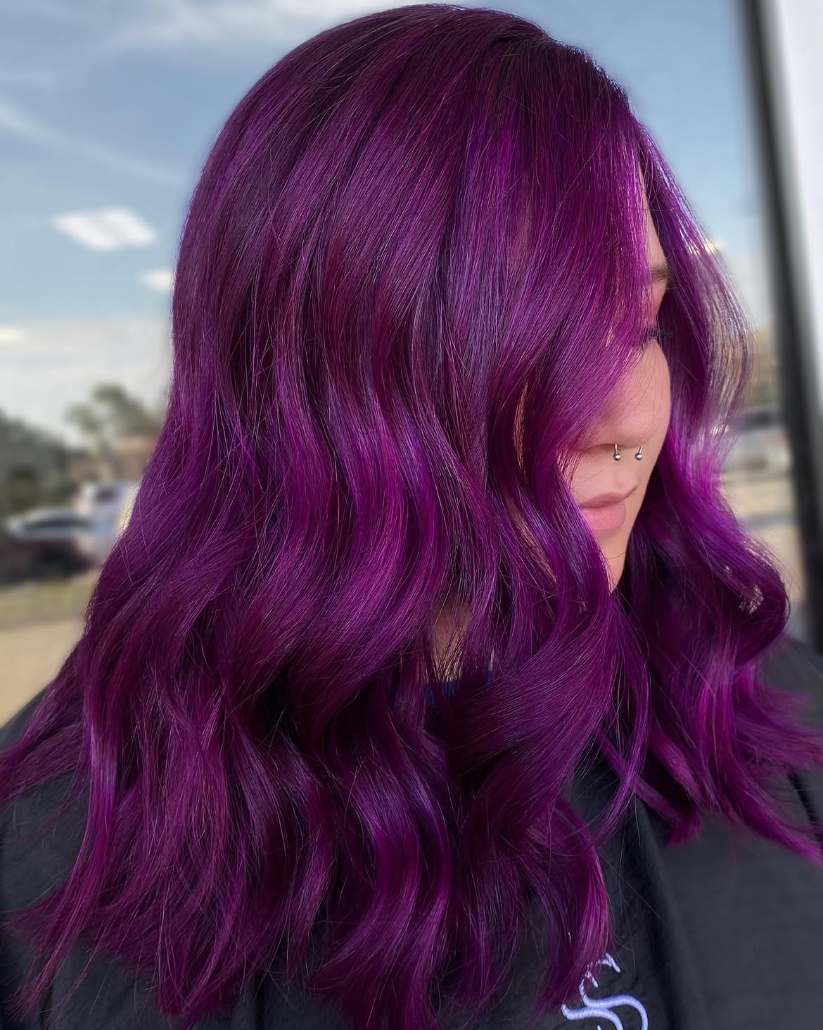 Vibrant Plum Waves With Face Framing Layers