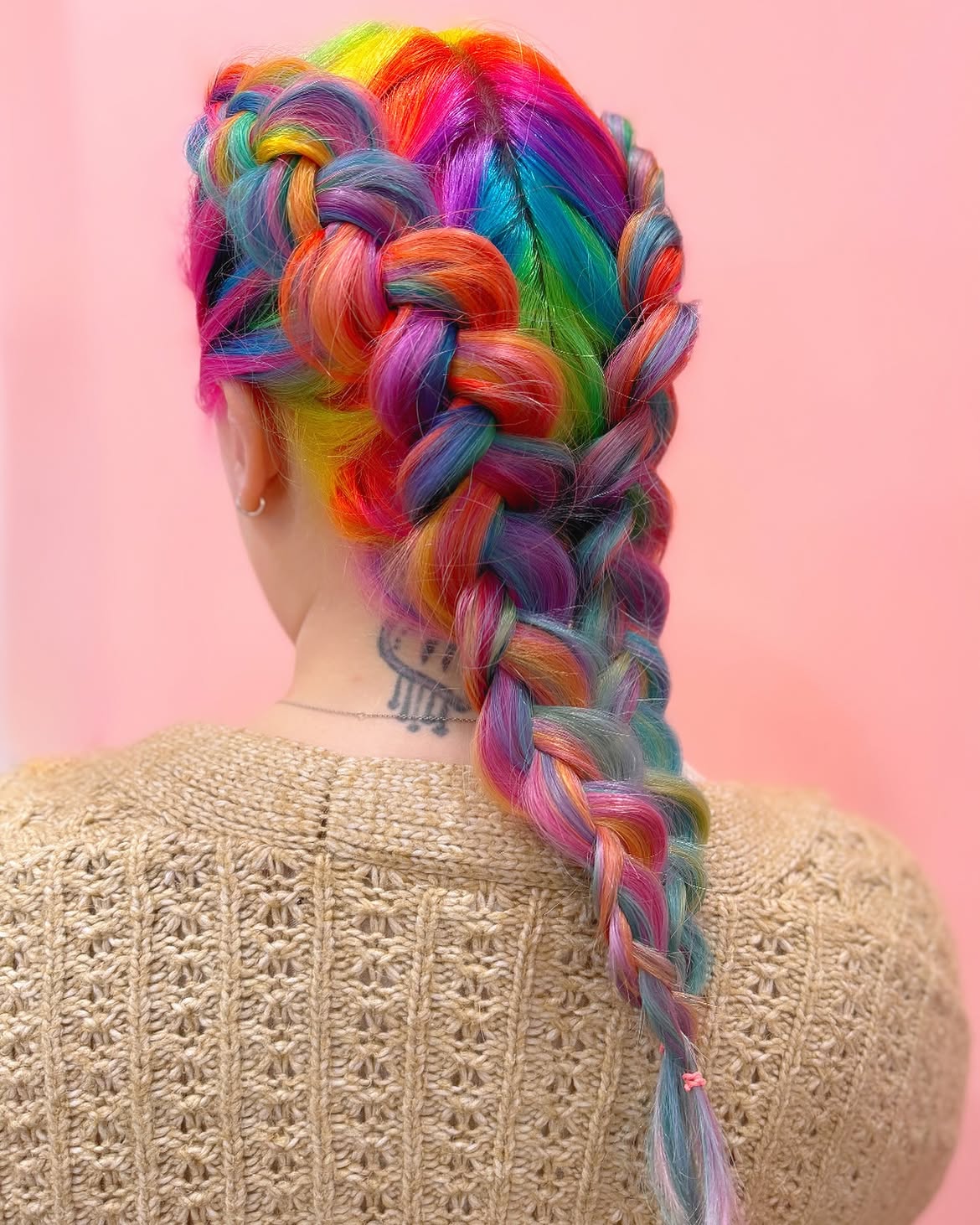Vibrant Rainbow Crown Braid With A Playful Braid