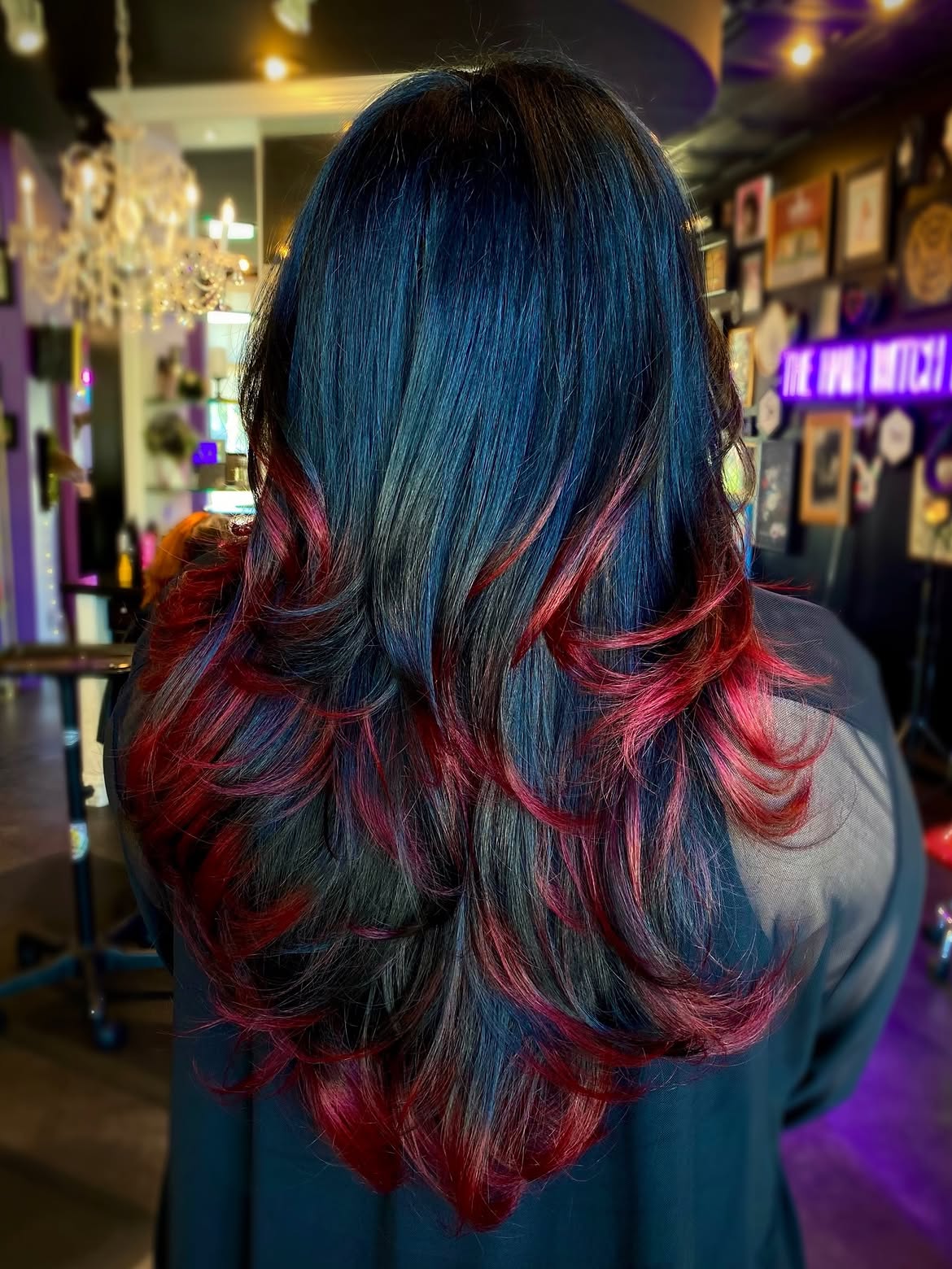 Vibrant Red Peekaboo Layers On Deep Black Hair
