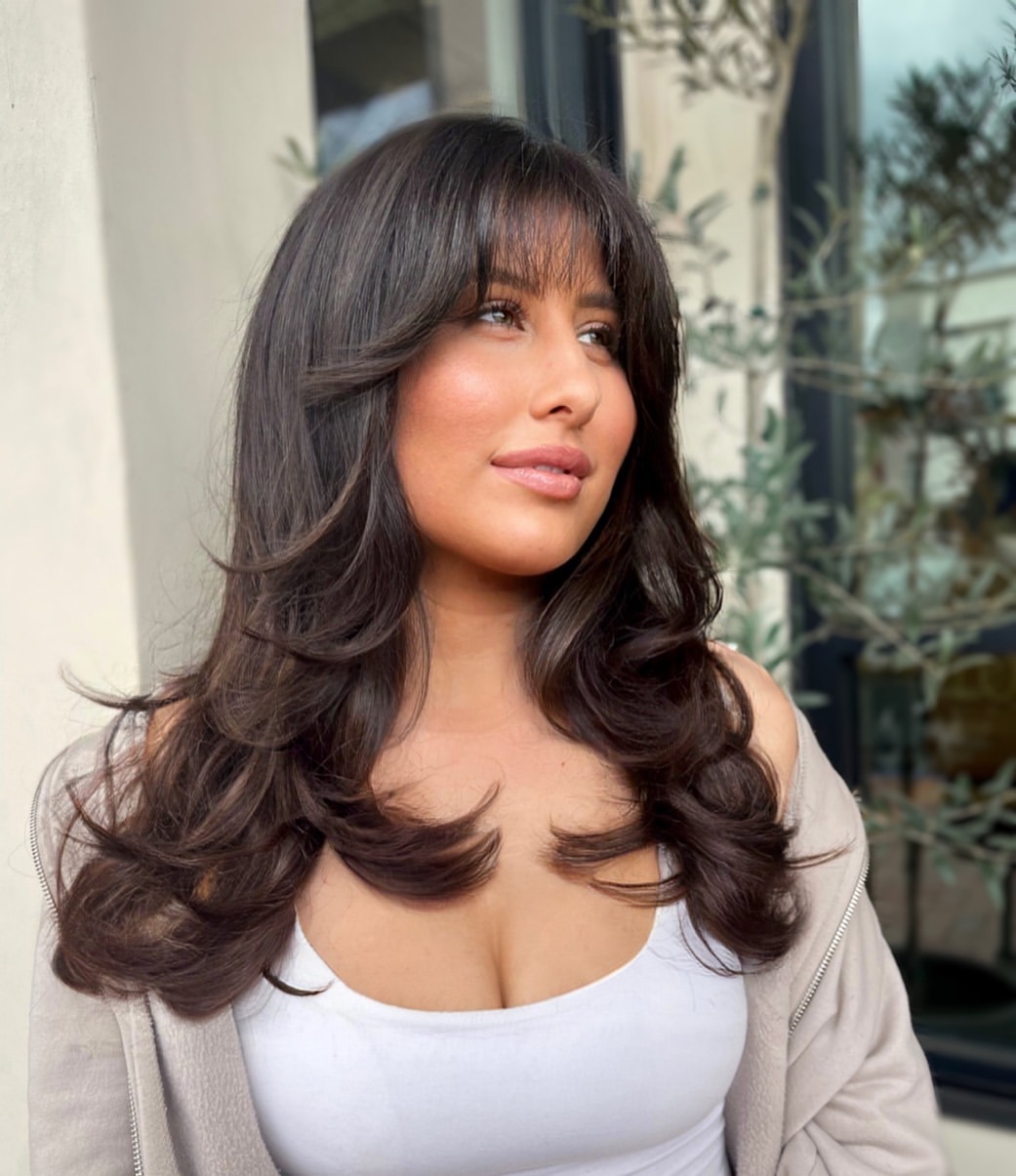 Voluminous 70s Inspired Layers With Dark Brunette
