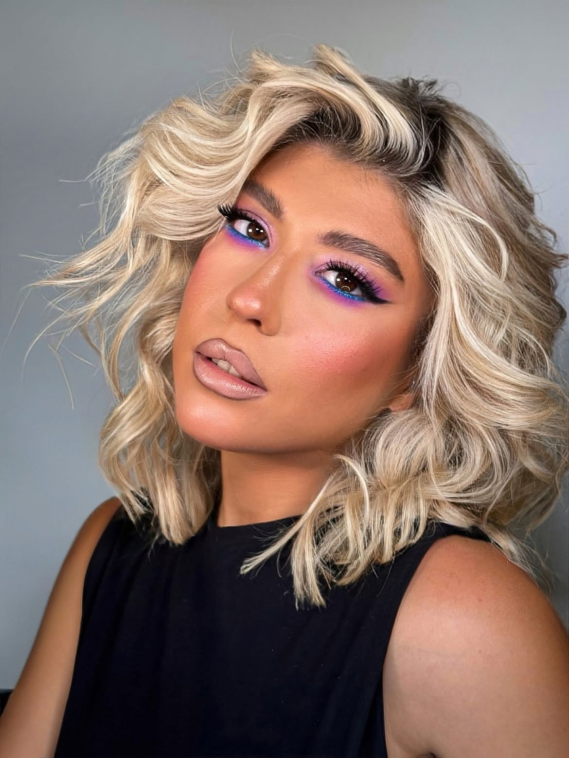 Voluminous Blonde Waves With Face-Framing Layers