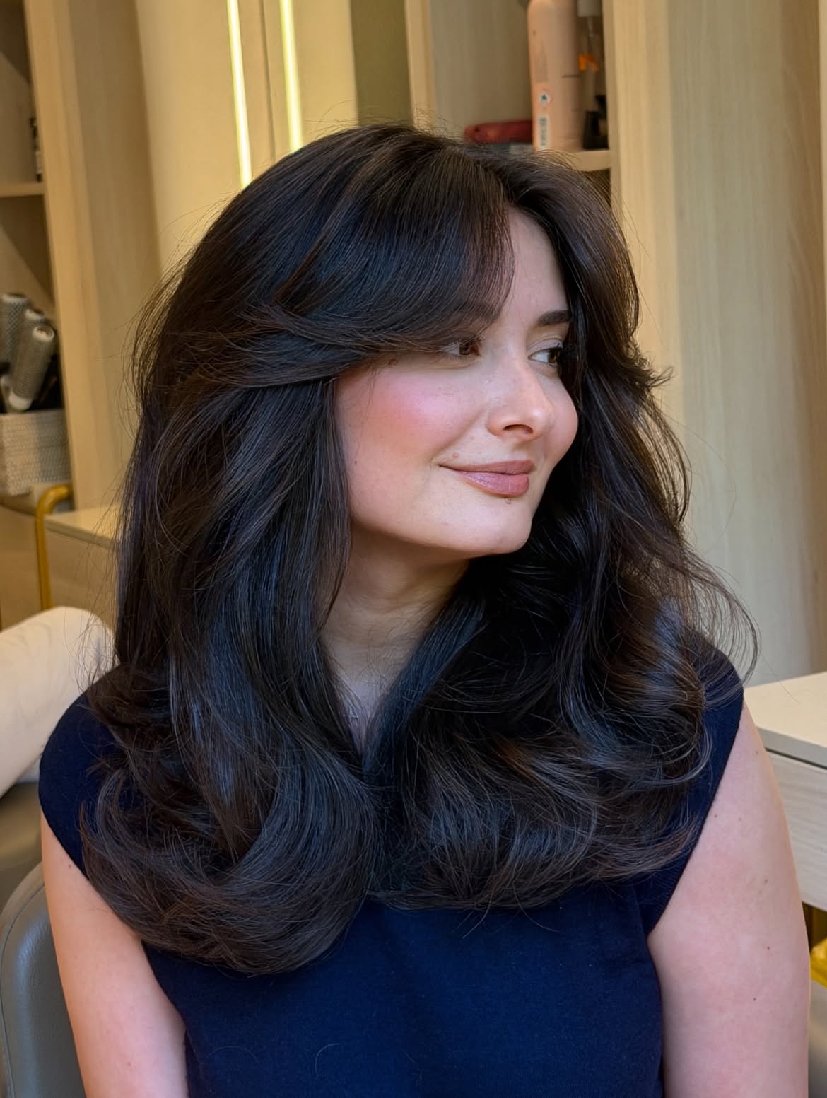 Voluminous Brunette Layers With Soft Sweeping Fringe