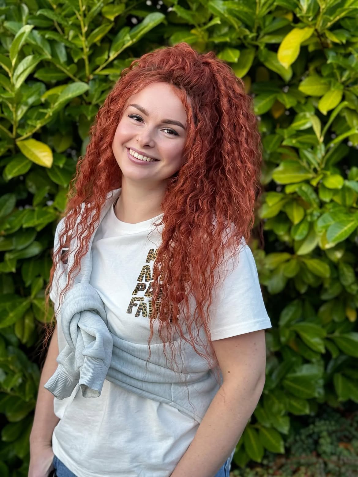 Voluminous Copper Curls With Half Up Style