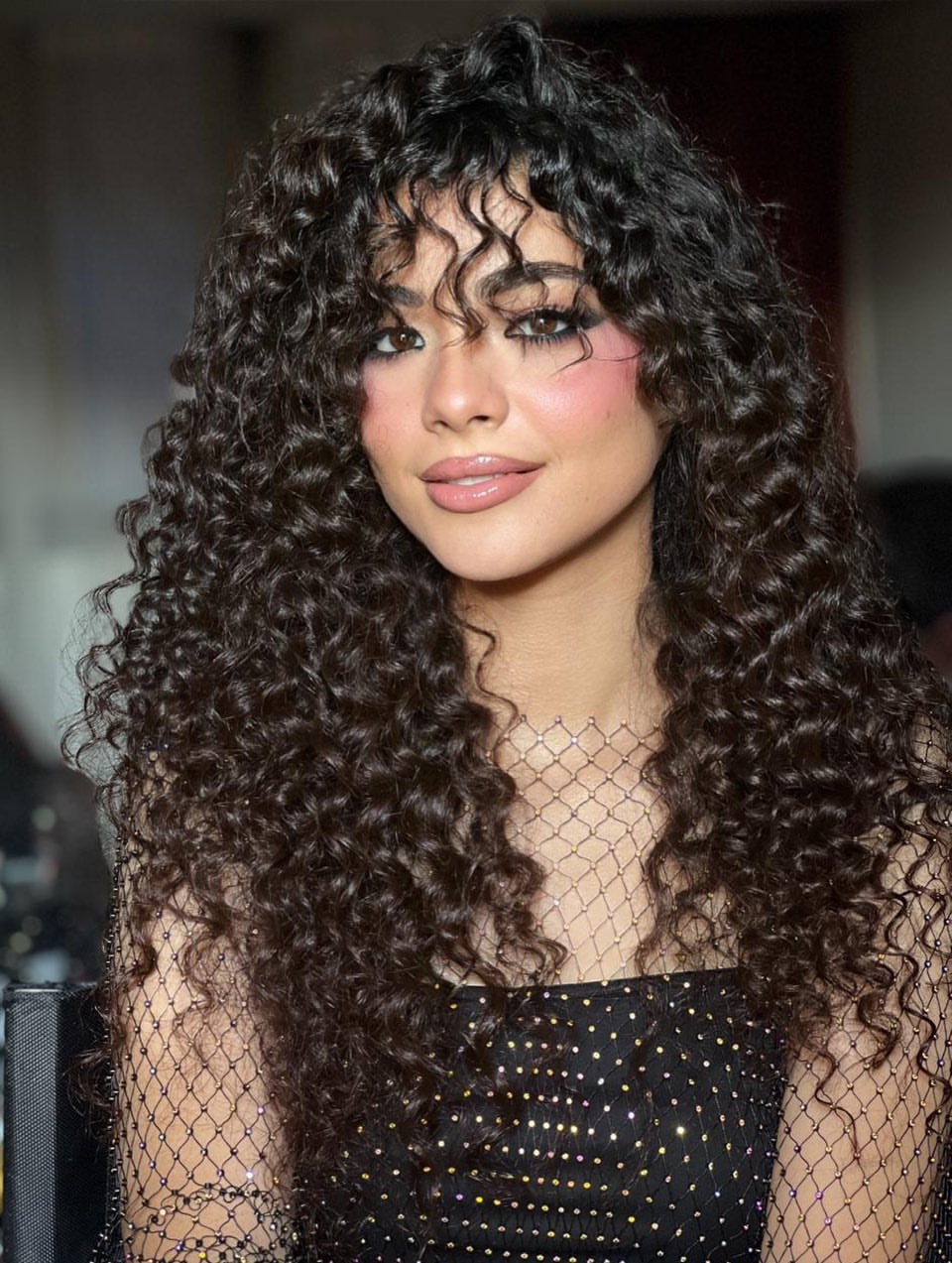 Voluminous Curly Cut With Textured Bangs