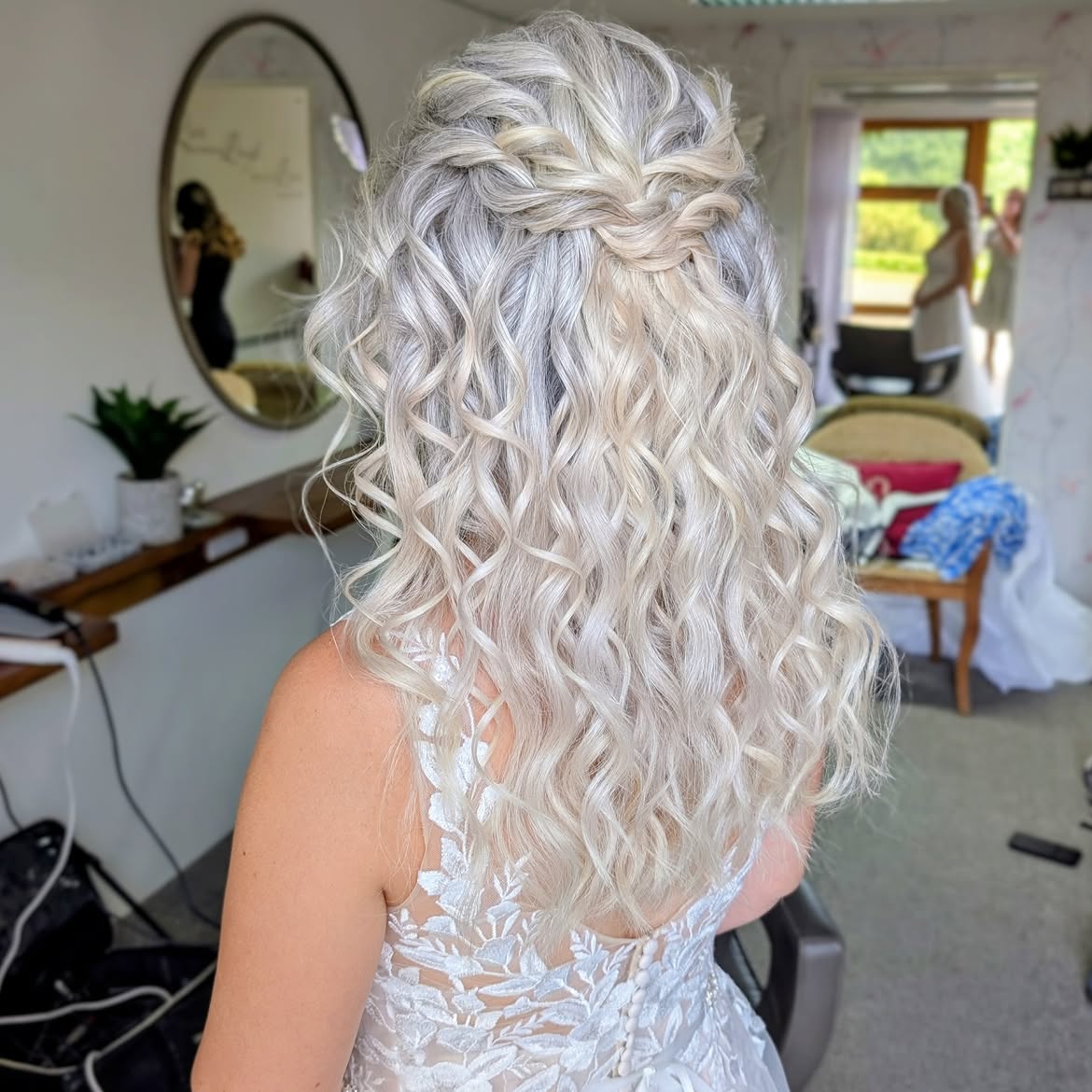 Voluminous Half-Up Curls With Braided Crown