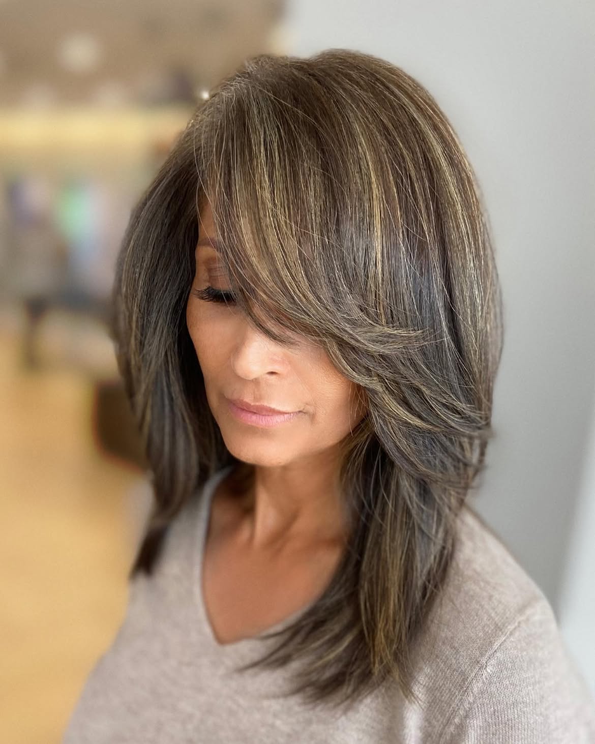 Voluminous Layered Cut With Sweeping Side Bangs