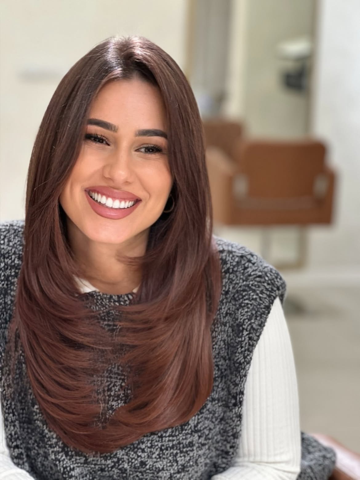 Voluminous Layered Cut With Warm Auburn Tones