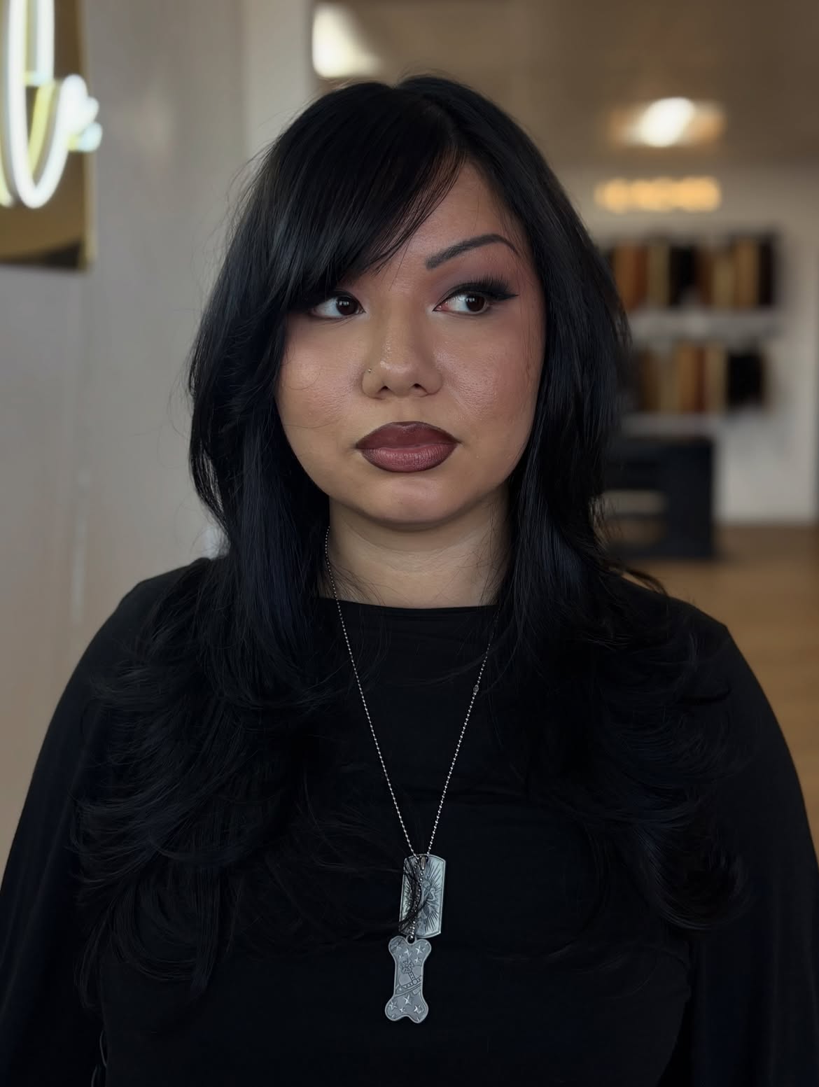 Voluminous Layers With Side Swept Bangs