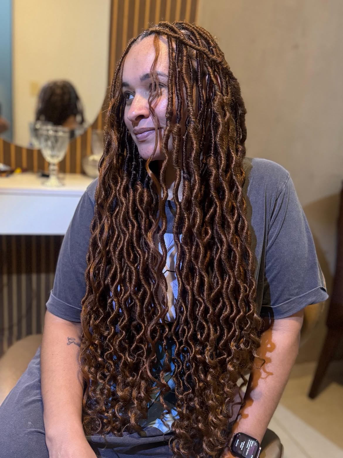 Voluminous Warm Brown Faux Locs With Defined Curls
