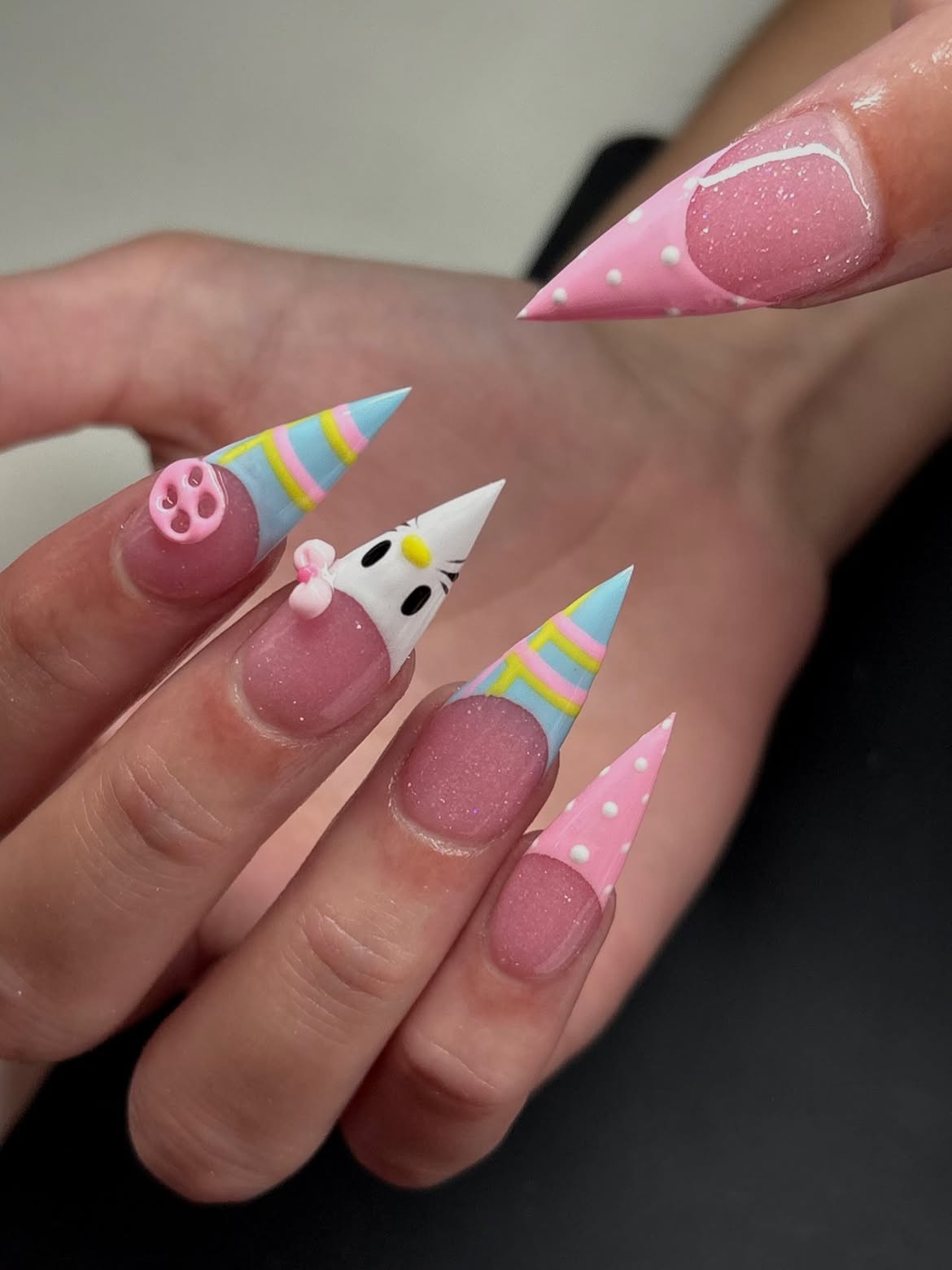Whimsical Character Stiletto Nails With Party Motifs