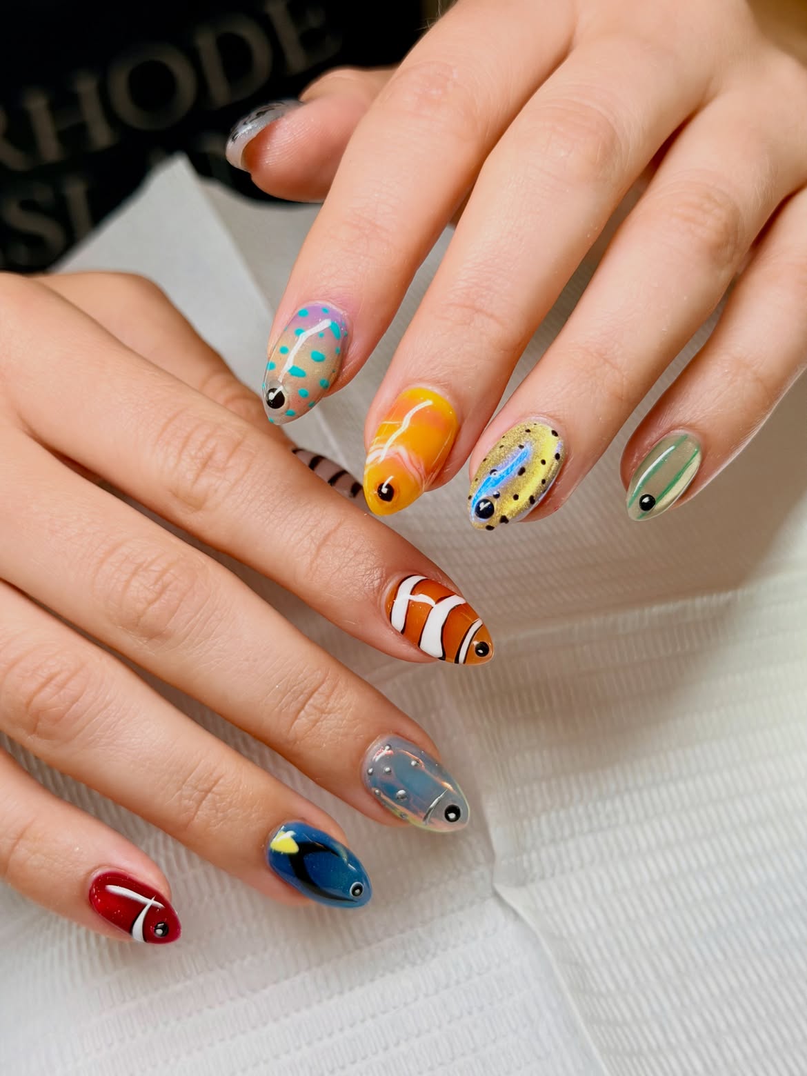 Whimsical Tropical Fish Themed Nail Art Design
