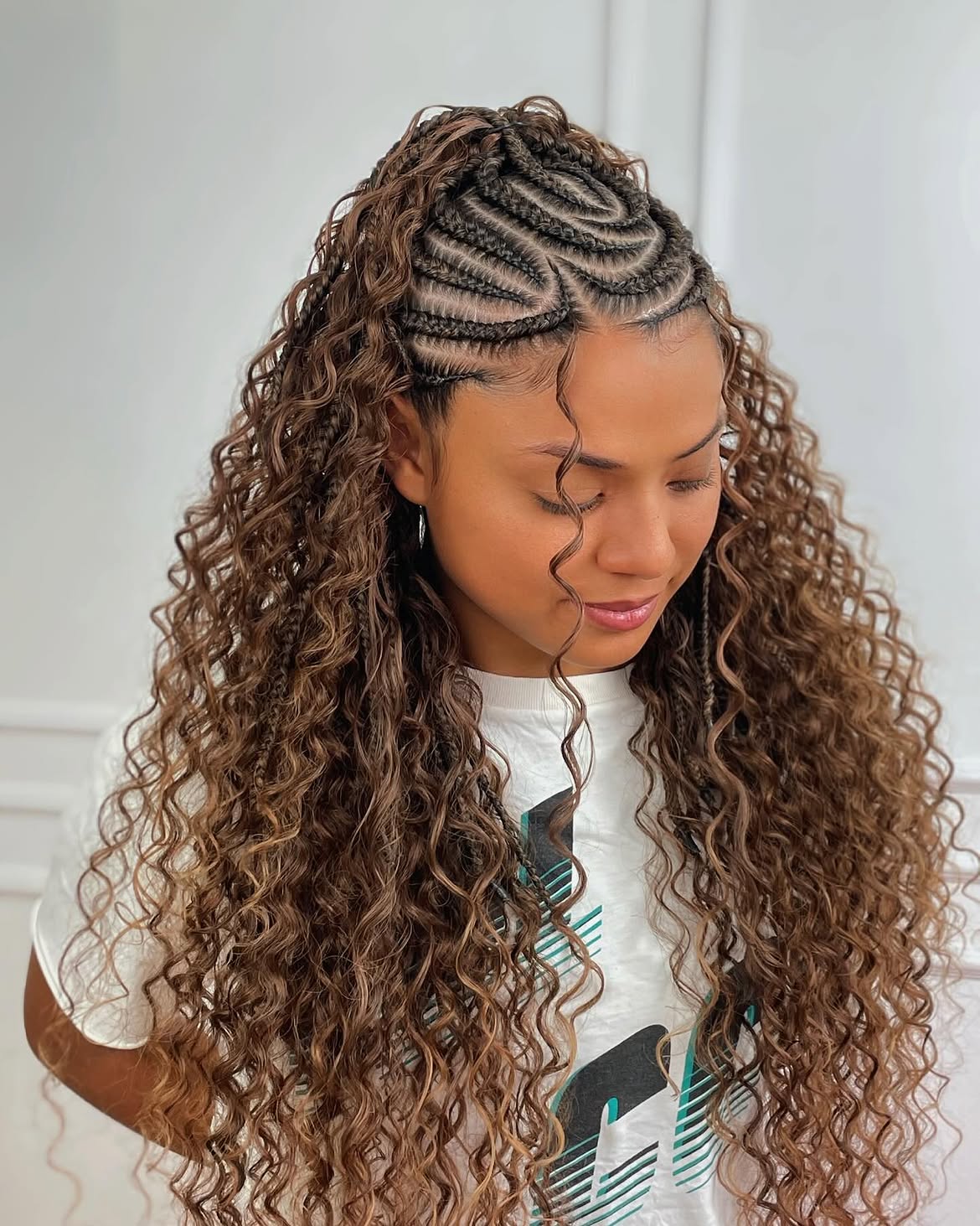 Artistic Cornrow Braids With Loose Curls