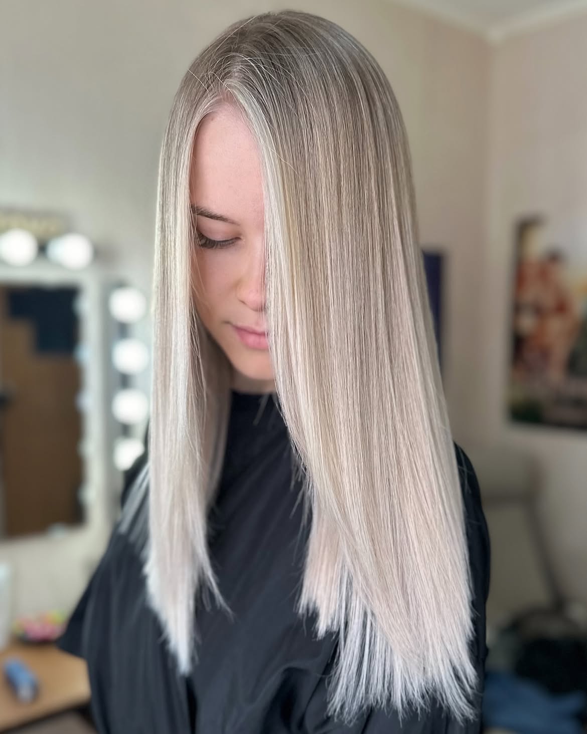 Ash Blonde Balayage With Subtle Face Framing
