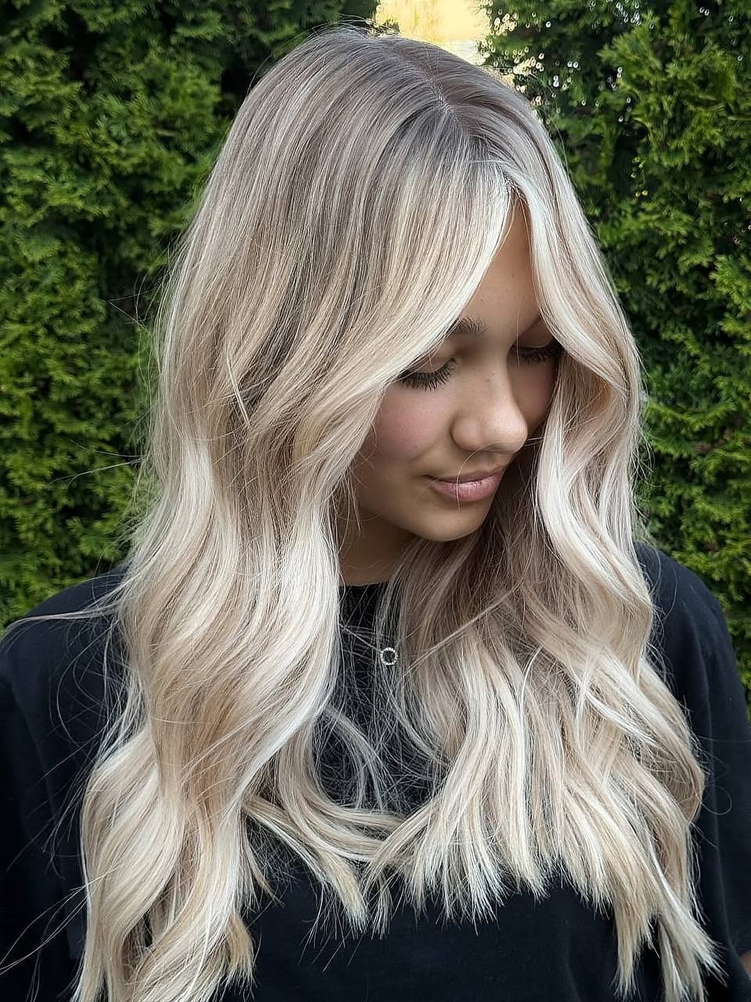 Ashy Blonde Waves With Face Framing Layers