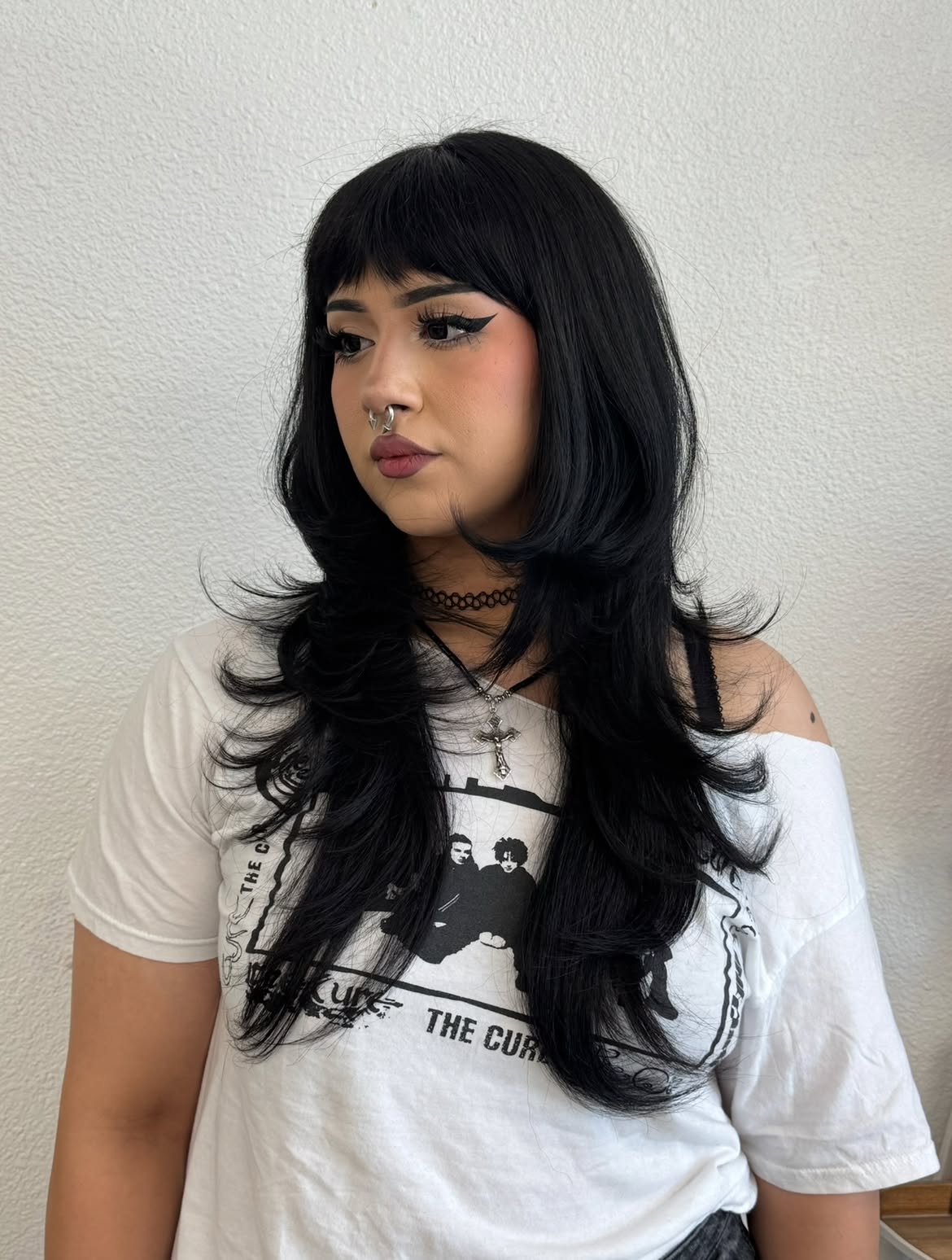 Black Shag With Wispy Bangs And Face Framing Layers