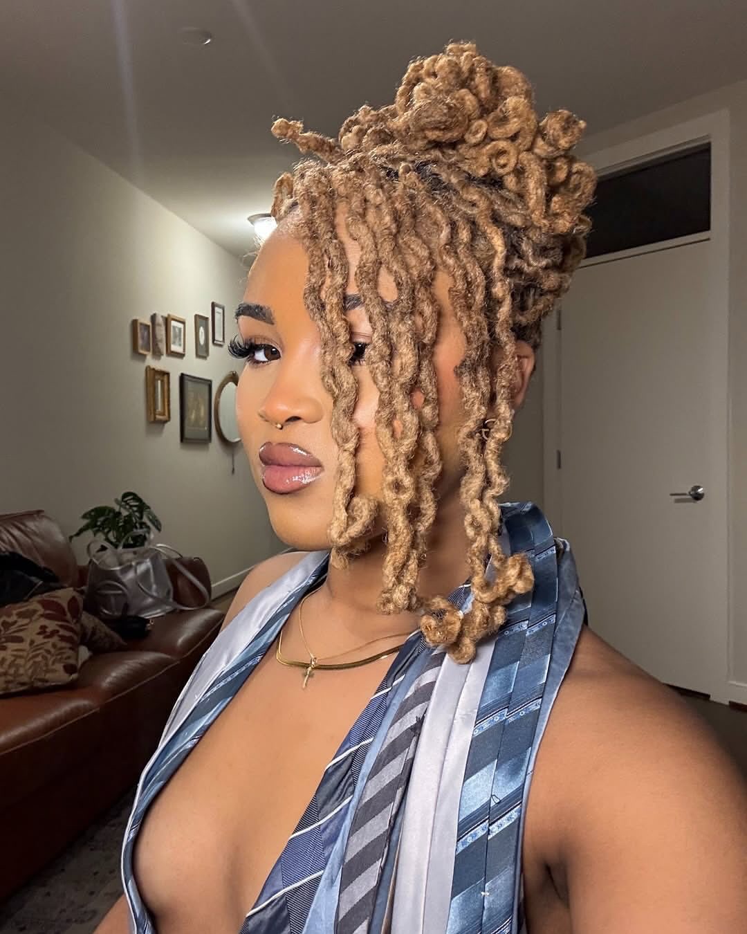 Blonde Dreadlocks In A Messy Top Knot