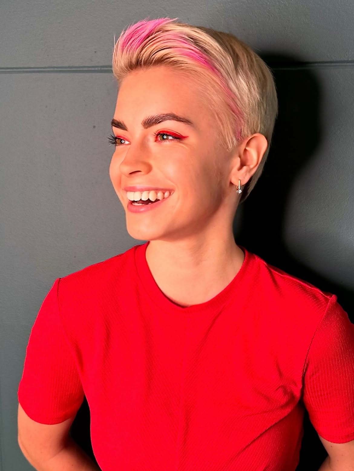 Blonde Pixie With Pink Streaks And Side Part