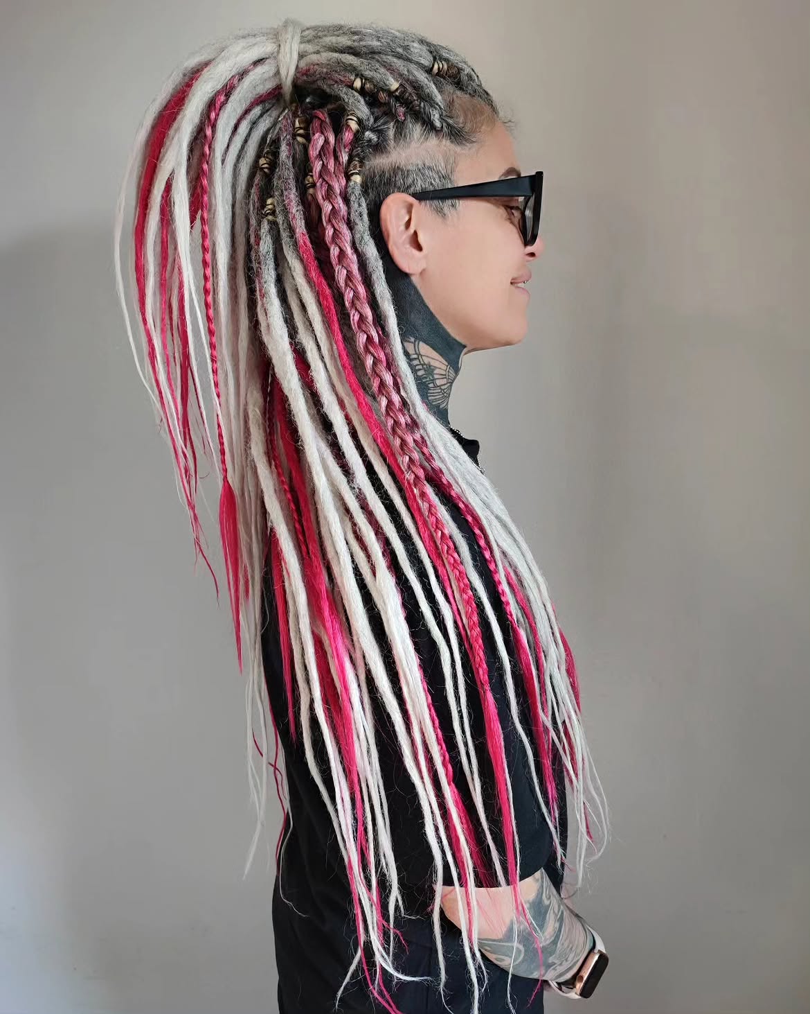 Bold Pink and White Dreads With Braided Accents