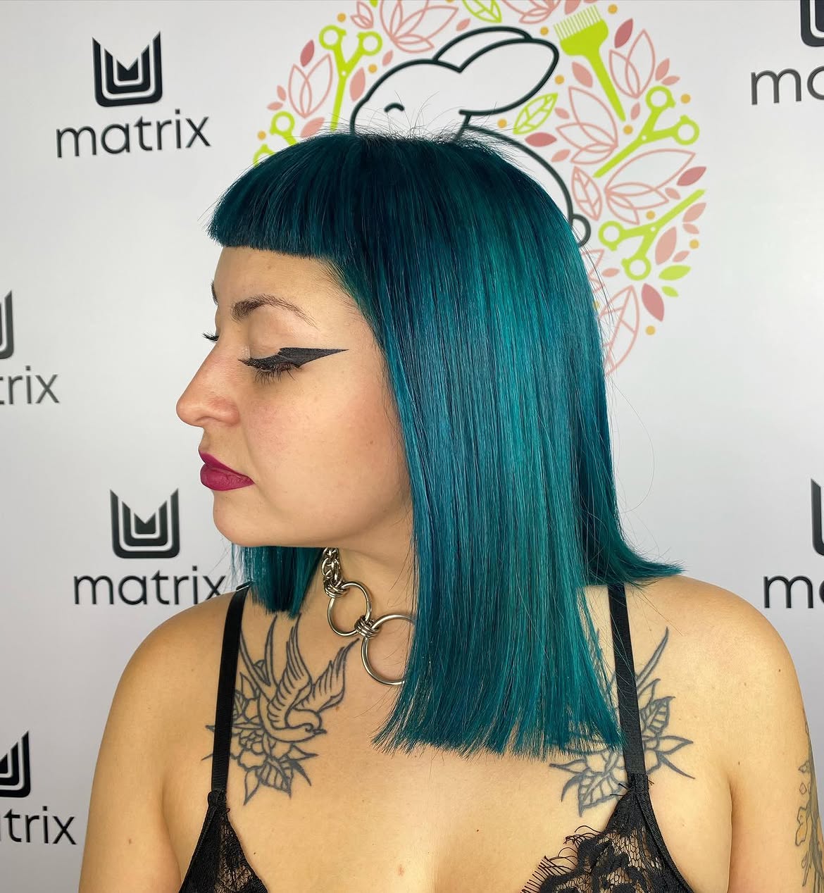Bold Teal Blunt Cut With Micro Bangs