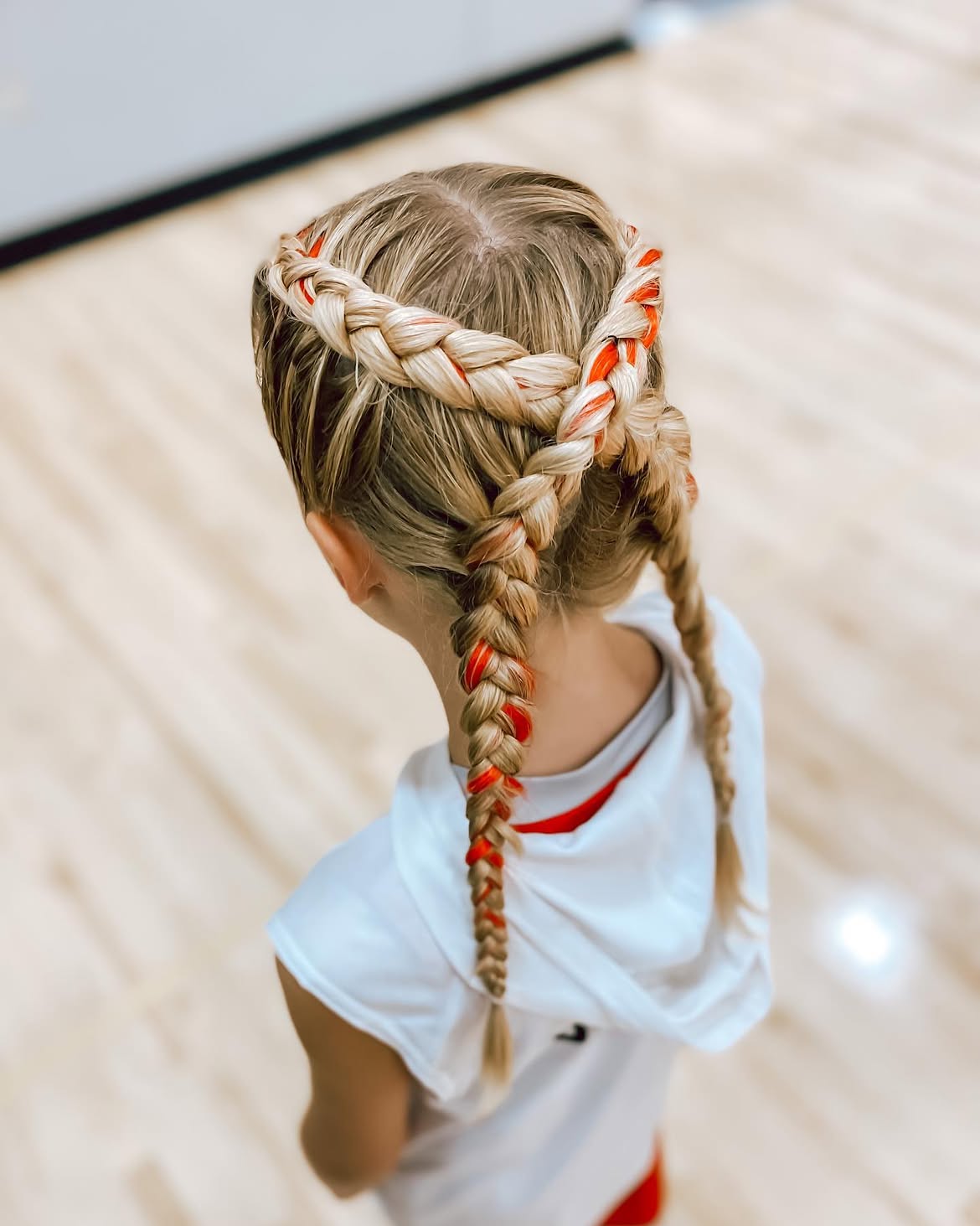Braided Crown With Red Ribbon Accents