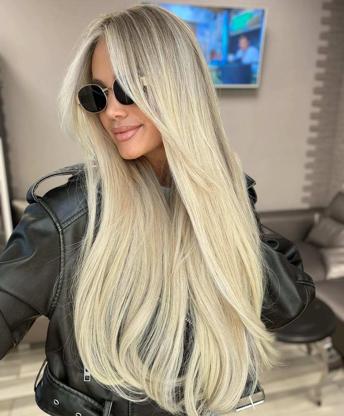 Bright Platinum Blonde With Face Framing Layers