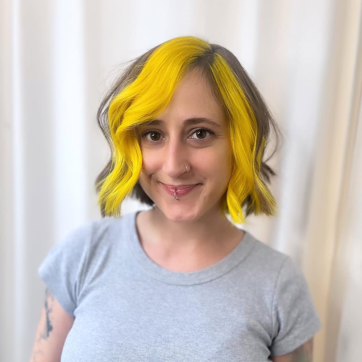 Bright Yellow Peekaboo Highlights On Ash Brown Bob