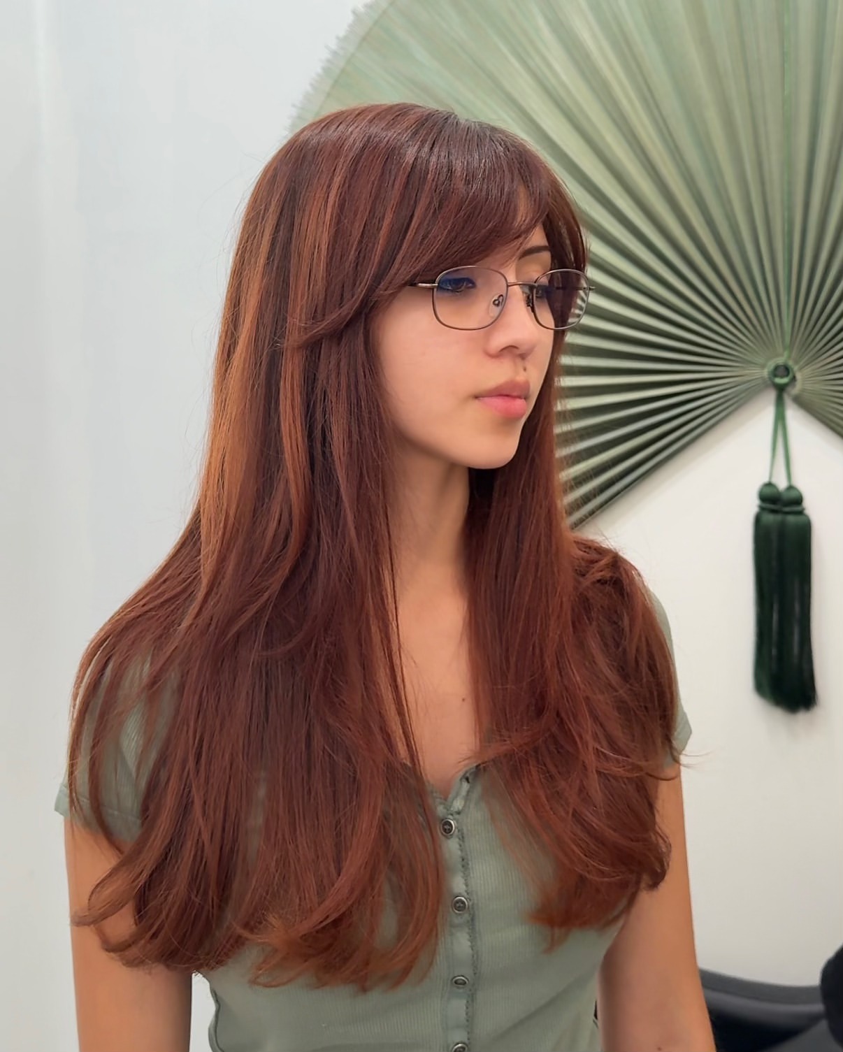 Chic Auburn Layers With Sweeping Side Bangs
