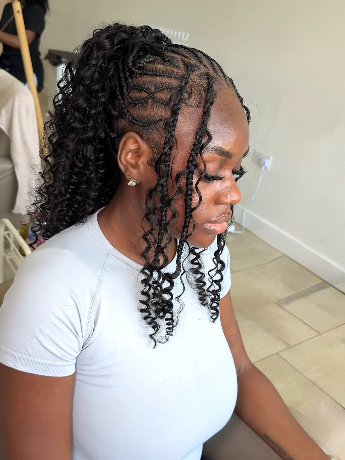 Chic High Ponytail With Braided Accents And Curls