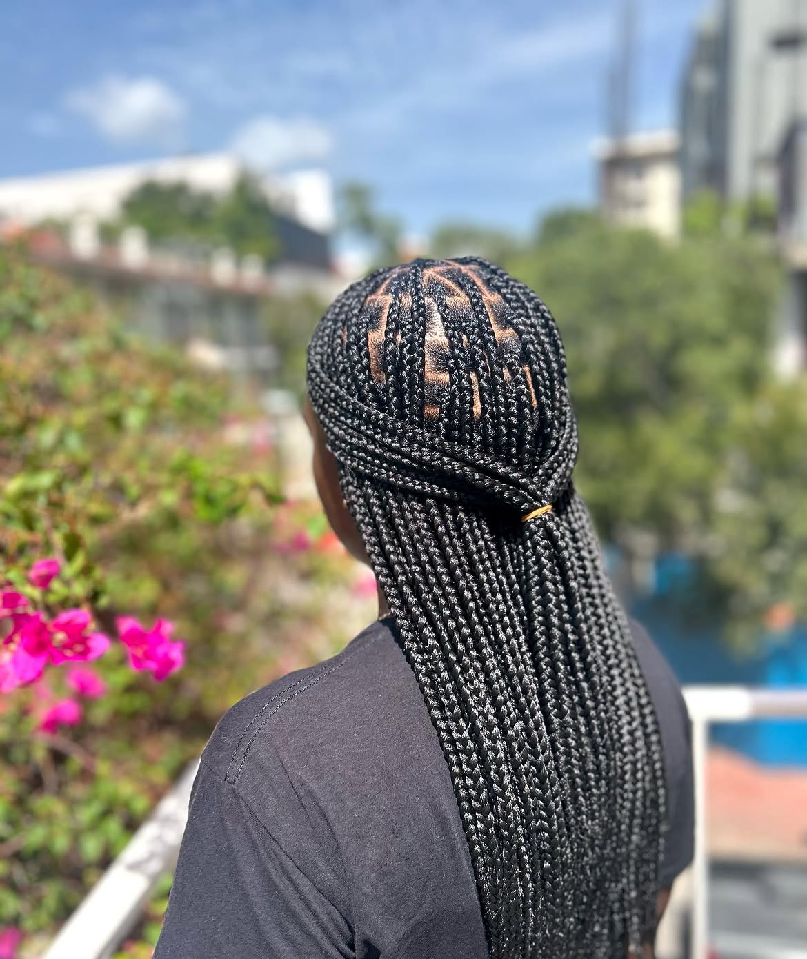Chic Medium Knotless Braids With Half-Up Style
