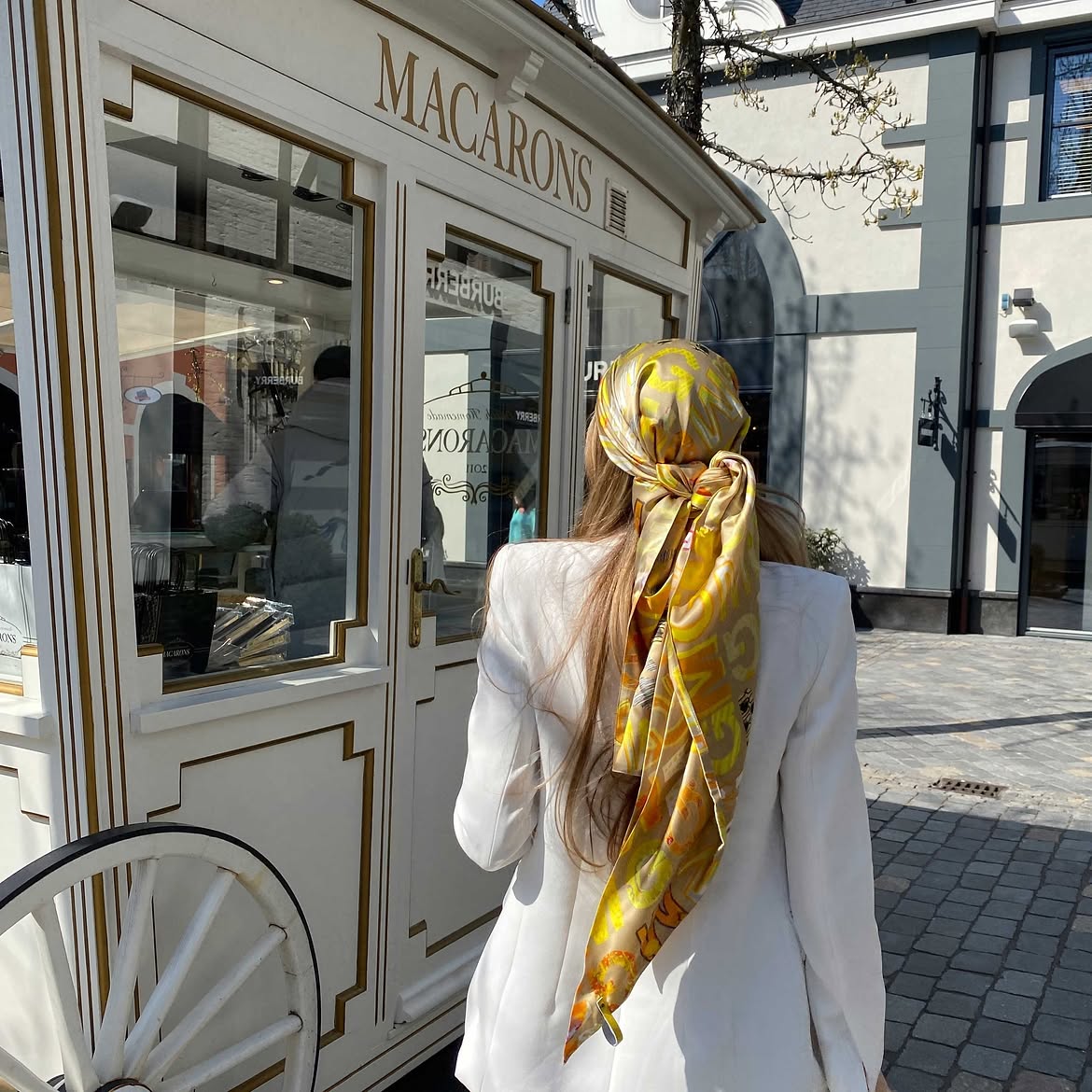 Chic Silk Scarf Tied Into Retro Ponytail