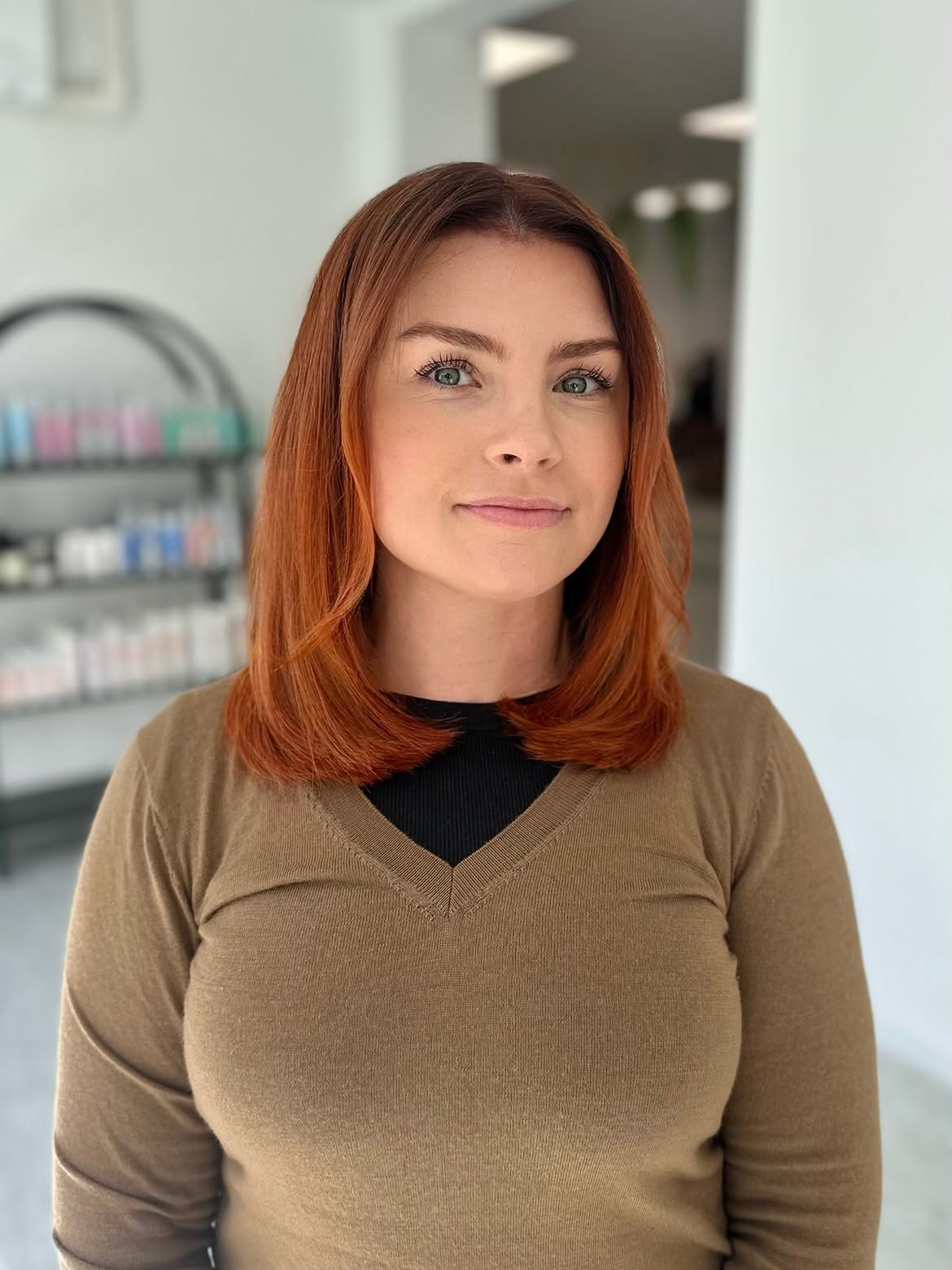 Copper Blonde Collarbone Bob With Subtle Waves