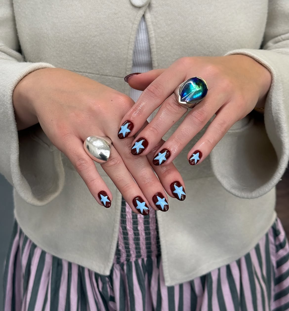 Cosmic Blue Star Glossy Brown Nails