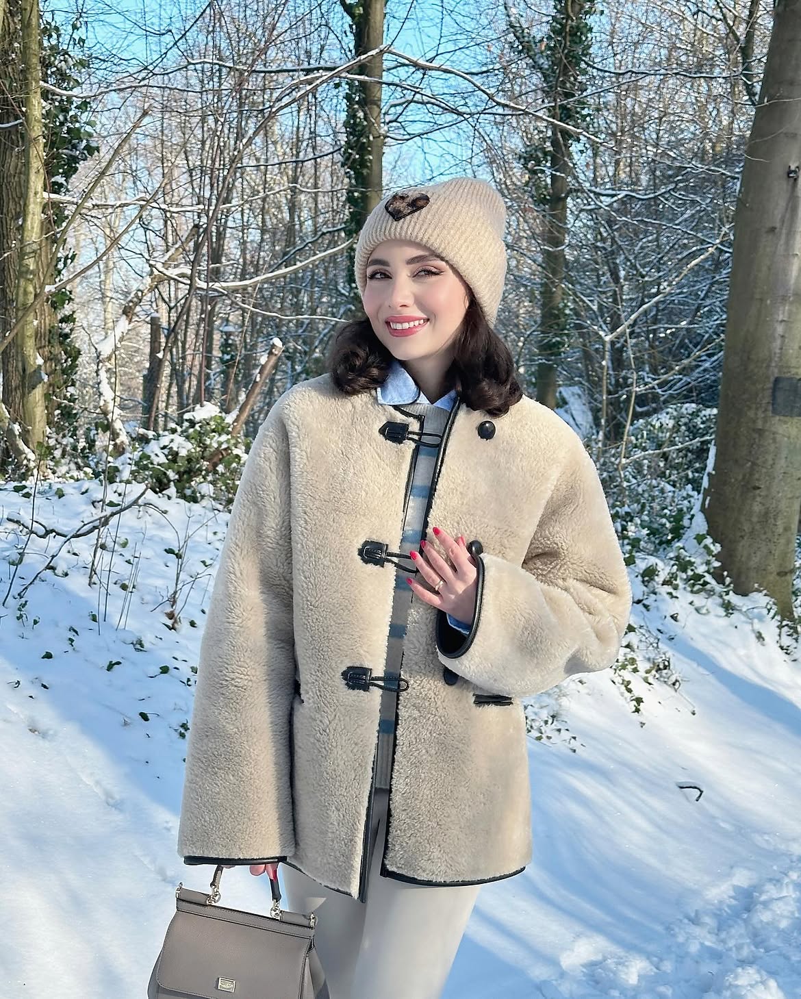 Cozy Shearling Coat And Striped Sweater Winter Outfit