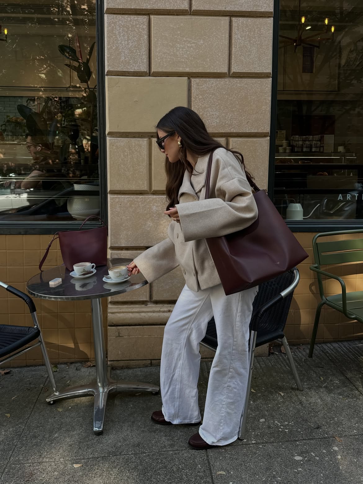 Cream Wool Jacket With White Trousers And Burgundy Tote