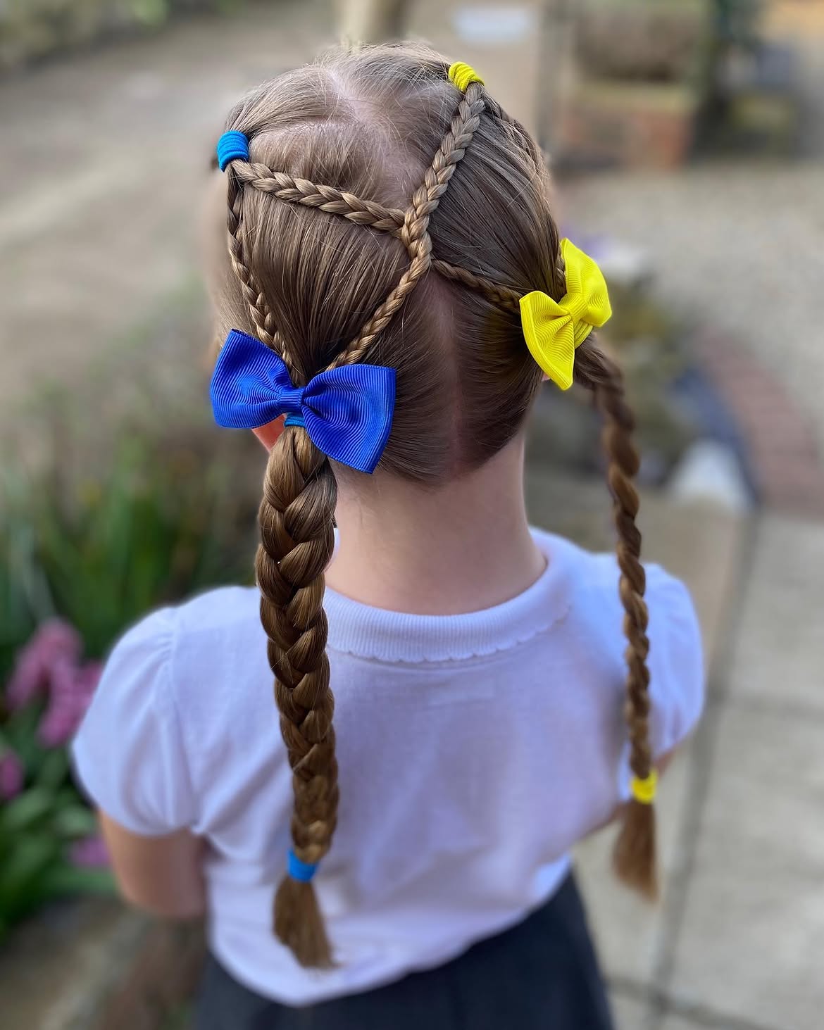 Criss Cross Braided Pigtails With Colorful Bows