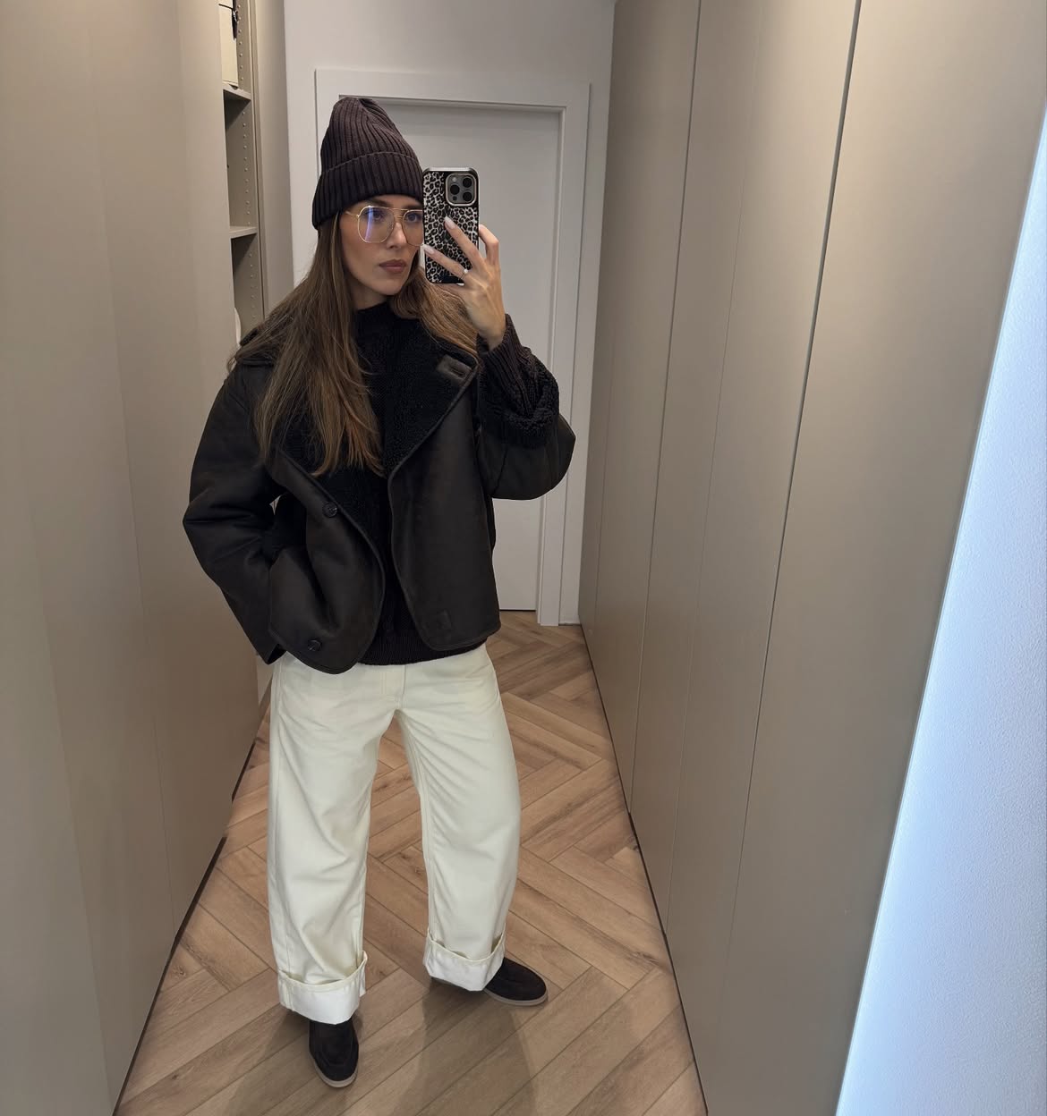 Dark Brown Shearling Jacket And Wide Leg White Trousers