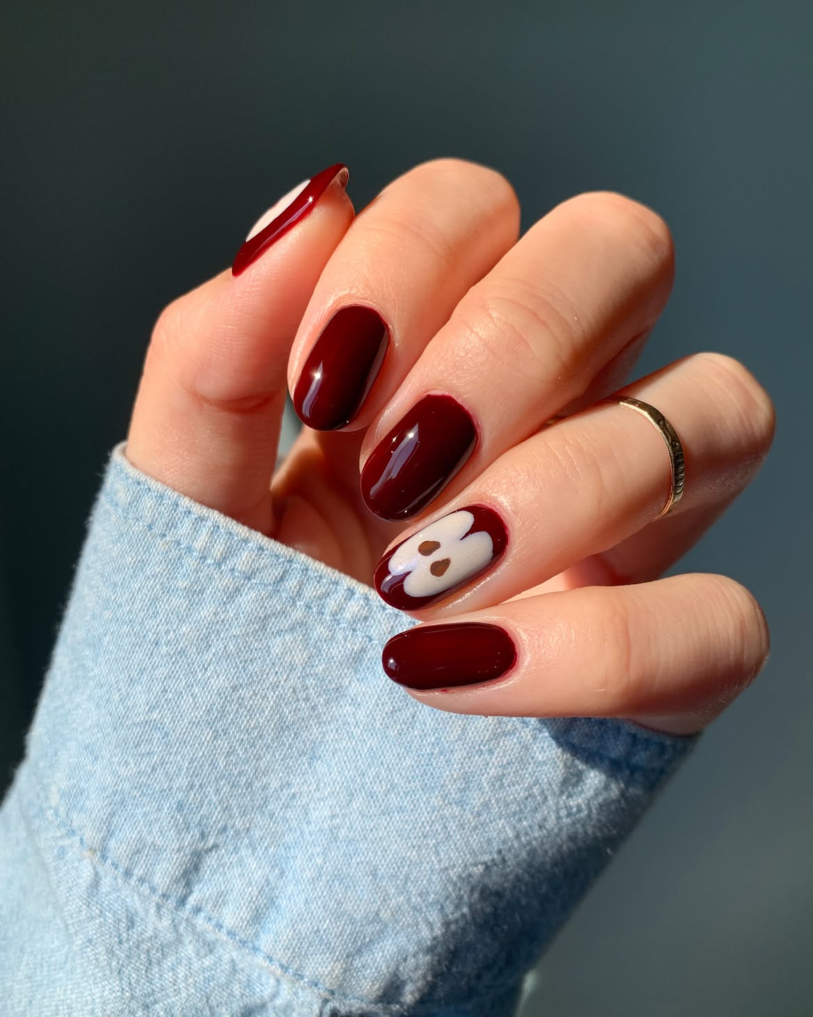 Deep Burgundy Glossy Nails with Floral Accents