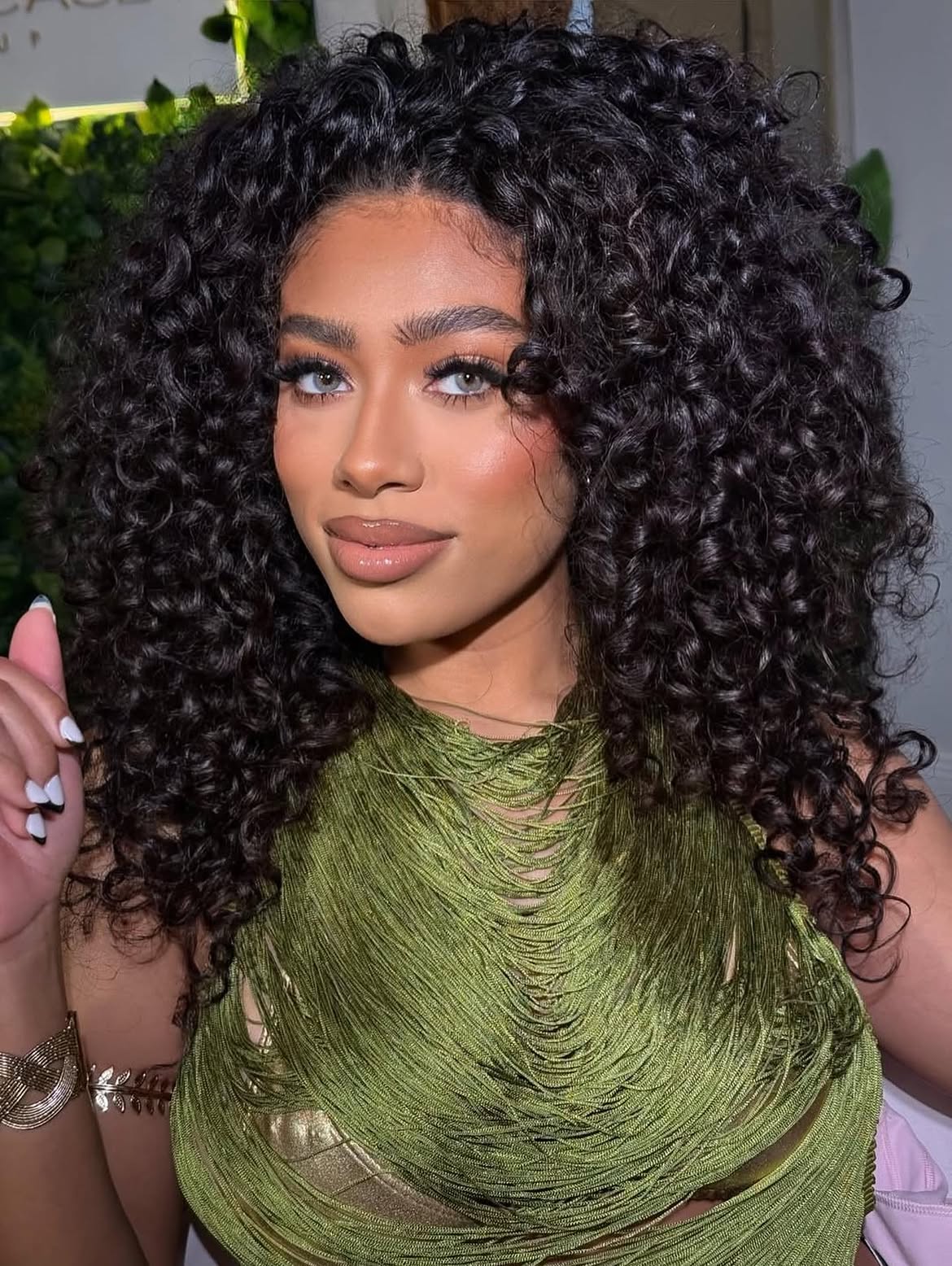 Defined Spiral Curls With Deep Side Part