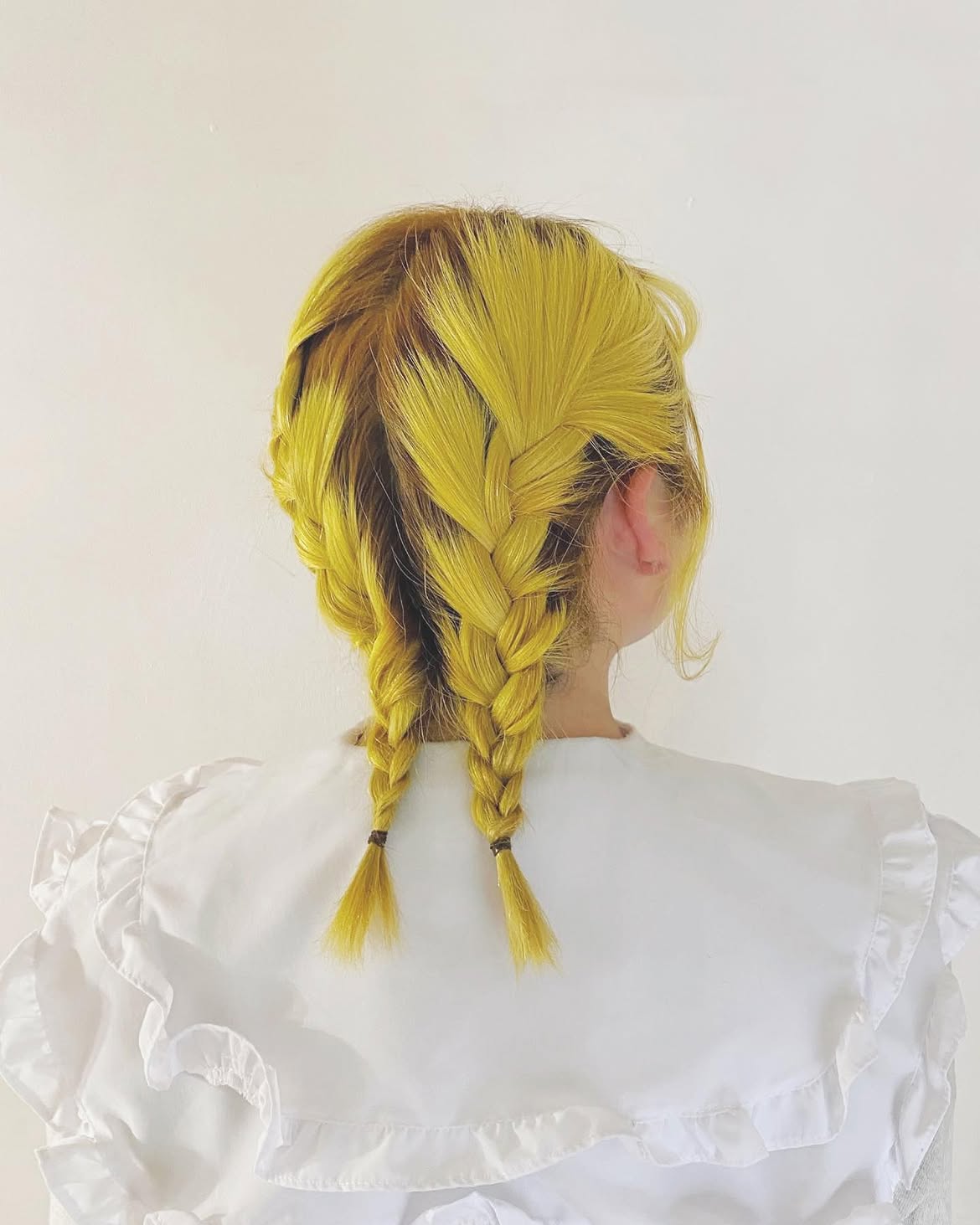 Double French Braids On Vibrant Electric Yellow Hair