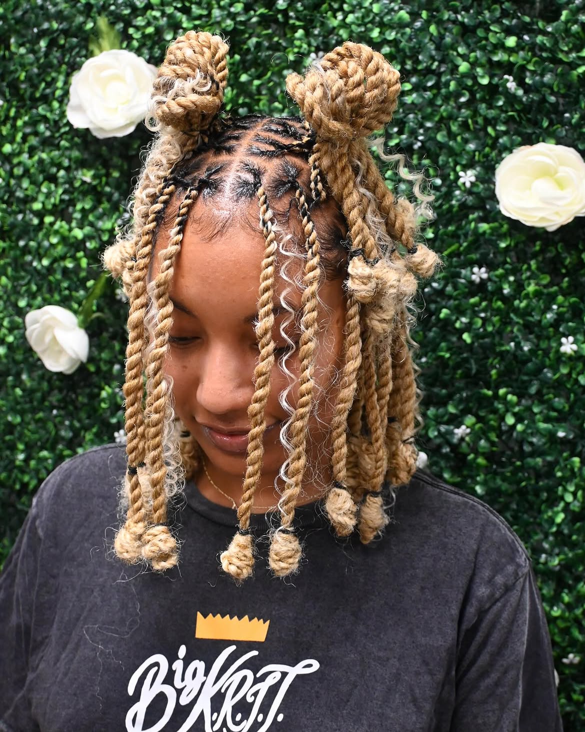 Double Space Buns With Twists and Curls