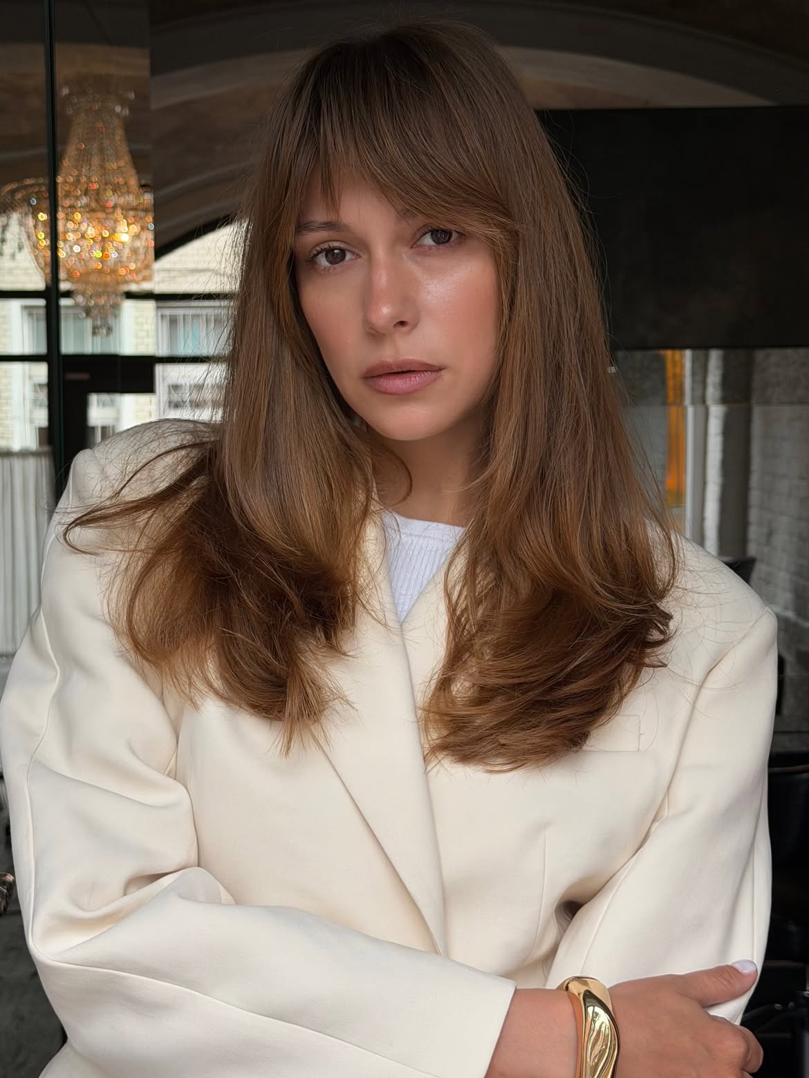 Effortless Honey Blonde Layers With Face Framing Bangs