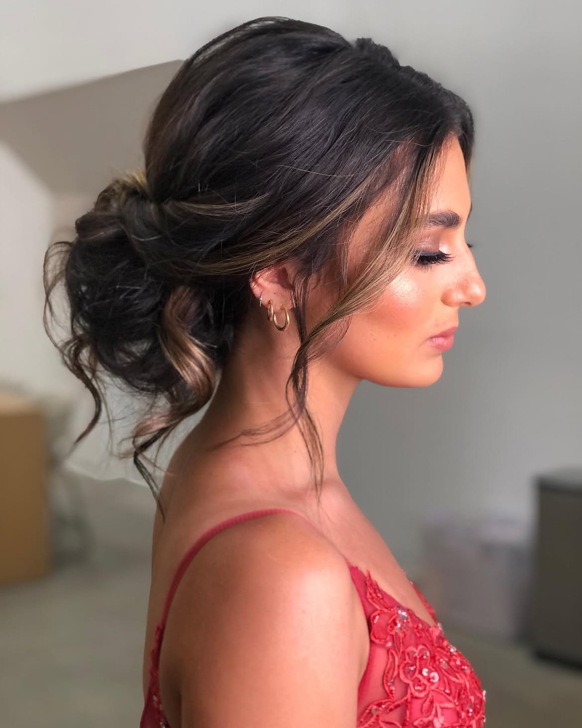 Effortless Romantic Low Bun With Face-Framing Strands