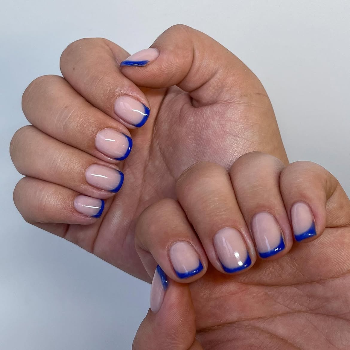 Electric Blue French Tip Short Almond Nails