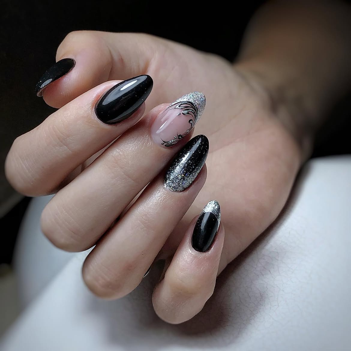Elegant Black & Silver Glitter Ombre Almond Nails