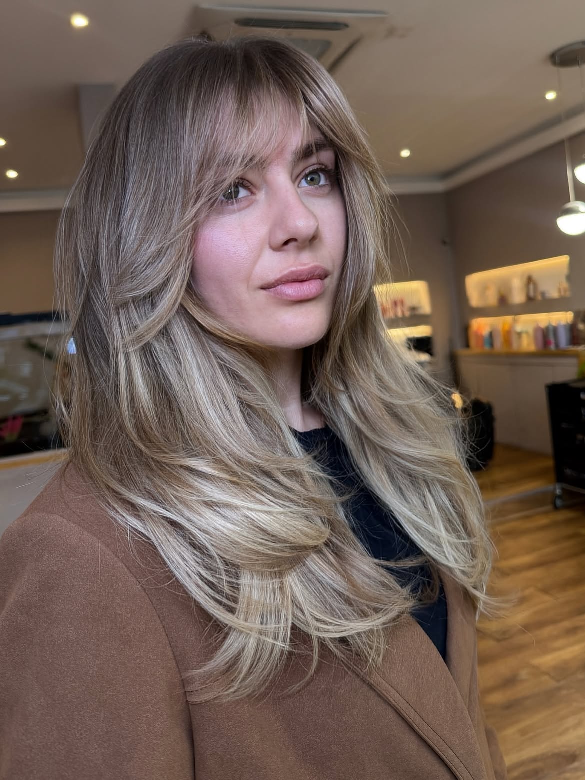 Face-Framing Layers With Honey Blonde Balayage