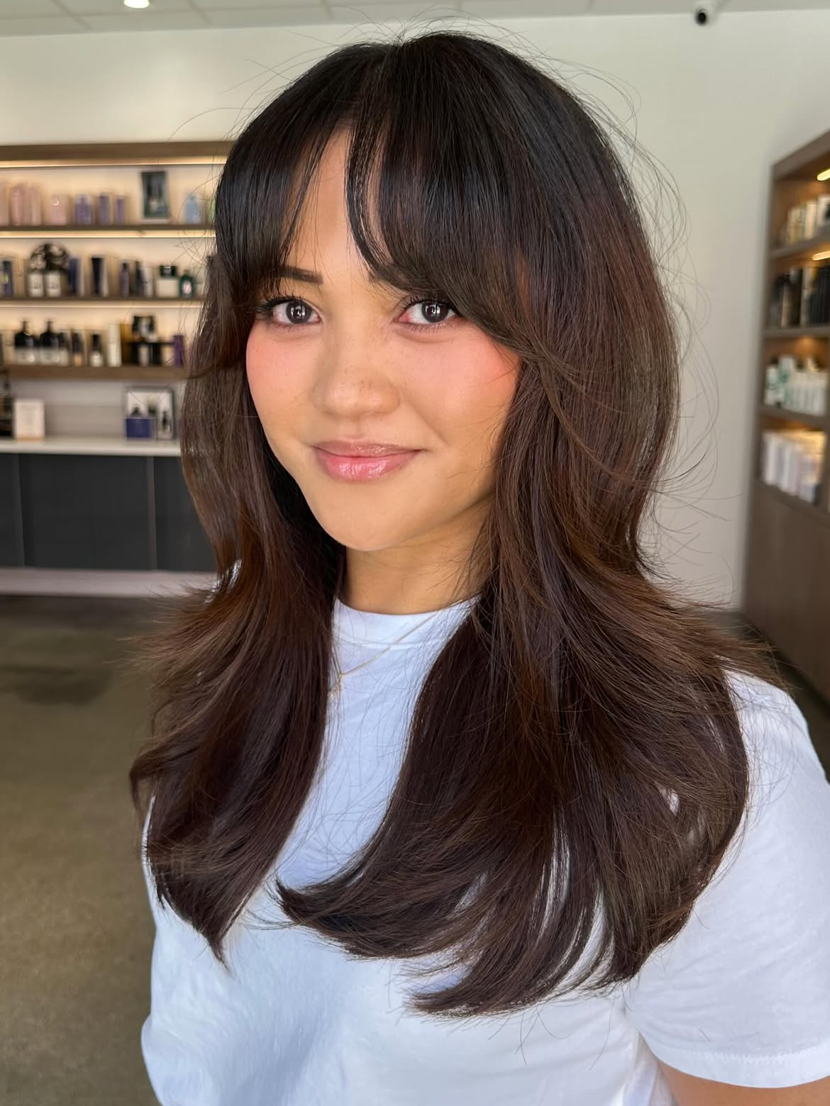 Face-Framing Layers With Wispy Bangs
