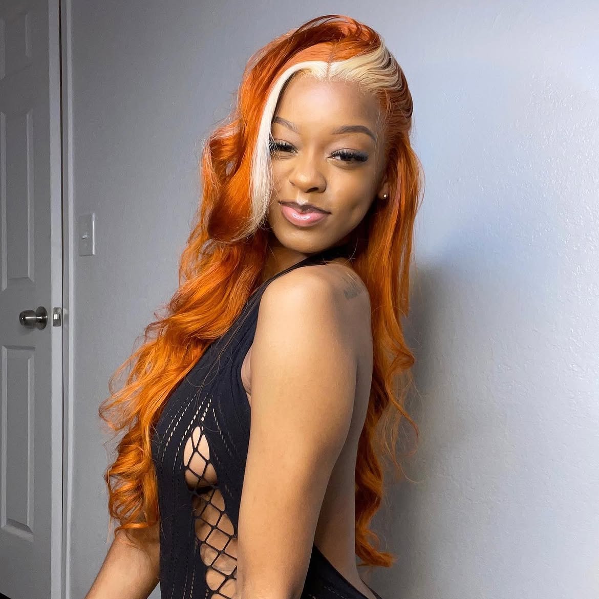 Fiery Orange Waves With Bold Blonde Money Piece