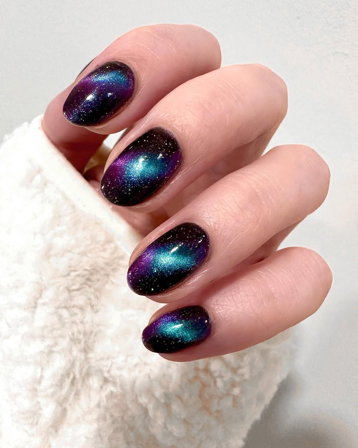 Galaxy Inspired Multichrome Cat Eye Oval Nails