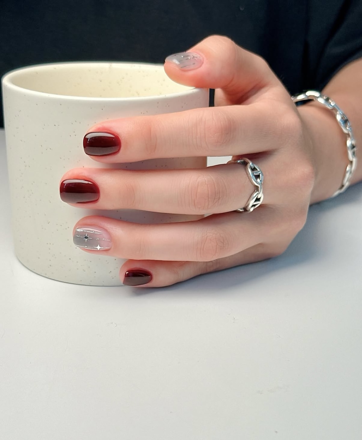 Glossy Burgundy And Silver Celestial Short Nails