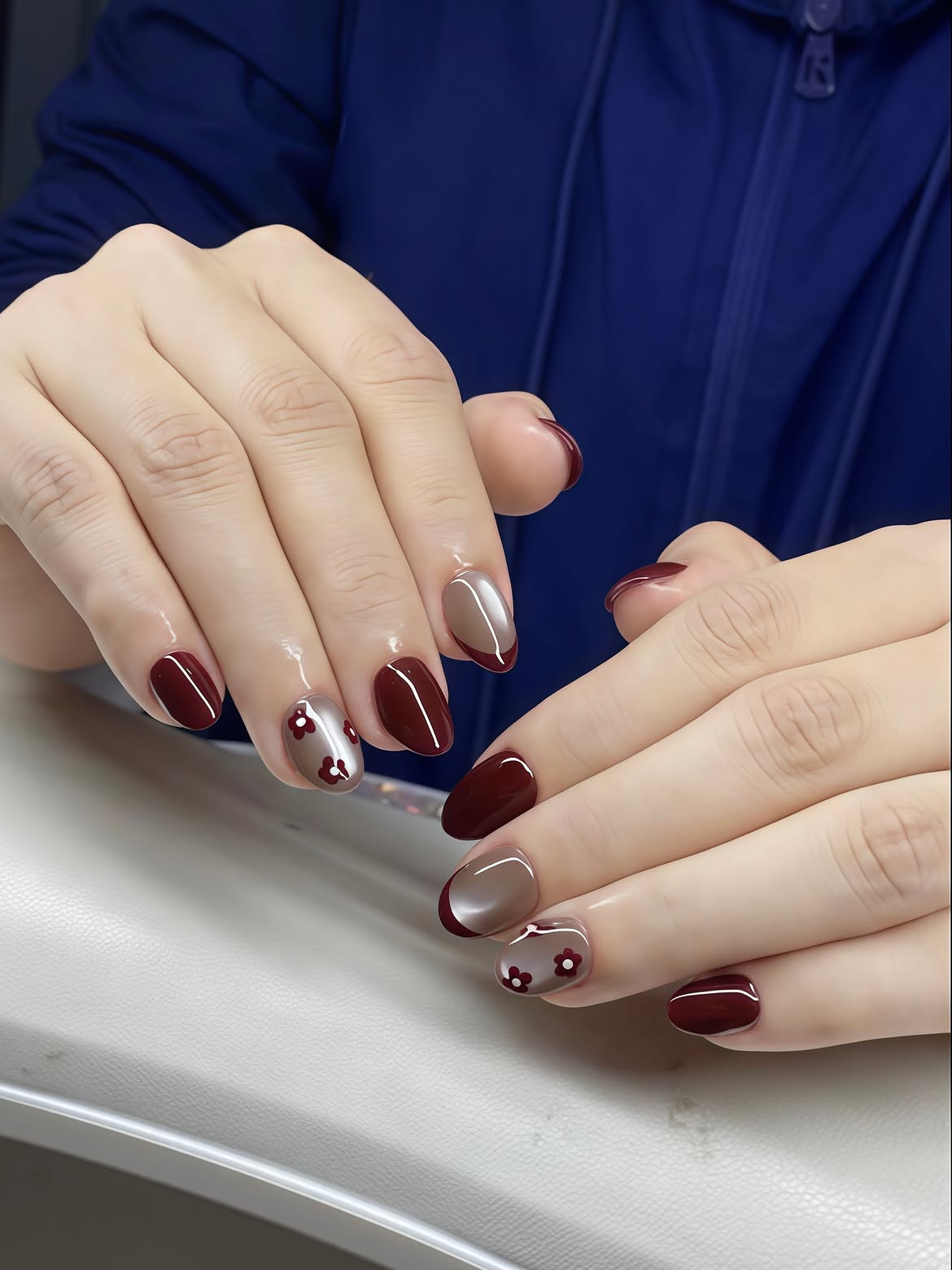 Glossy Burgundy And Taupe Floral Nail Art